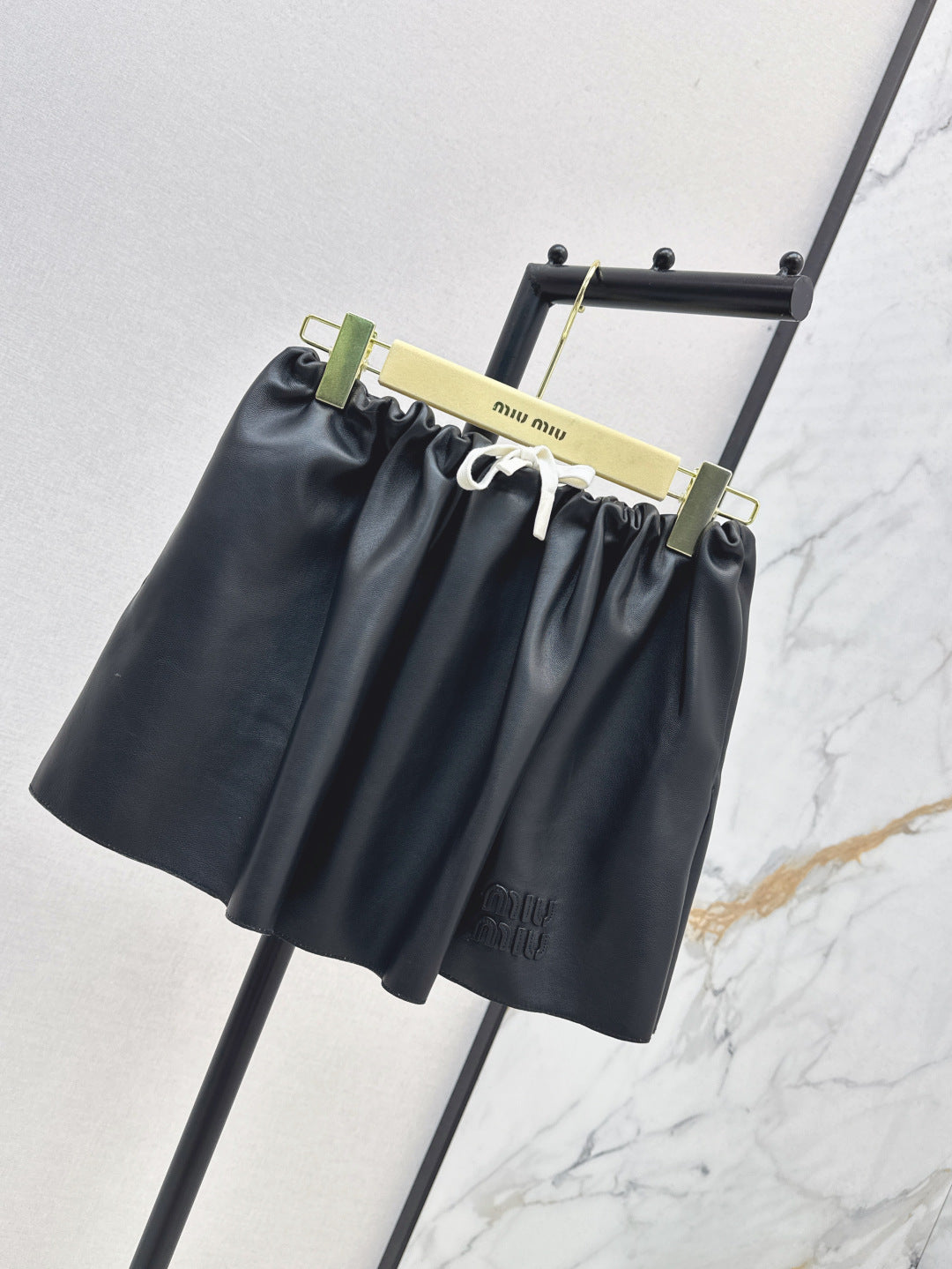 Miu 25ss leather skirt
