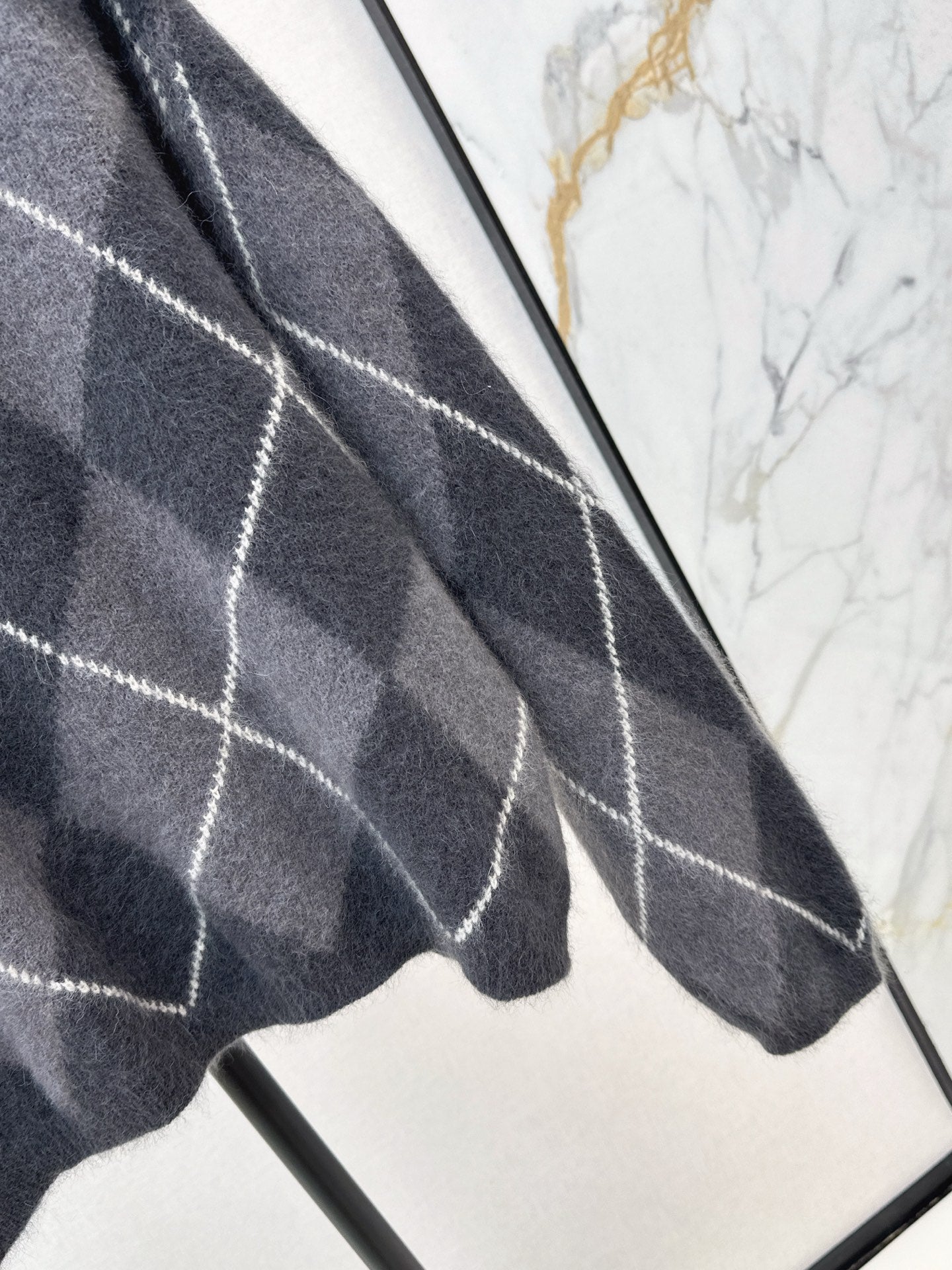 Loro 25fw plaid sweater