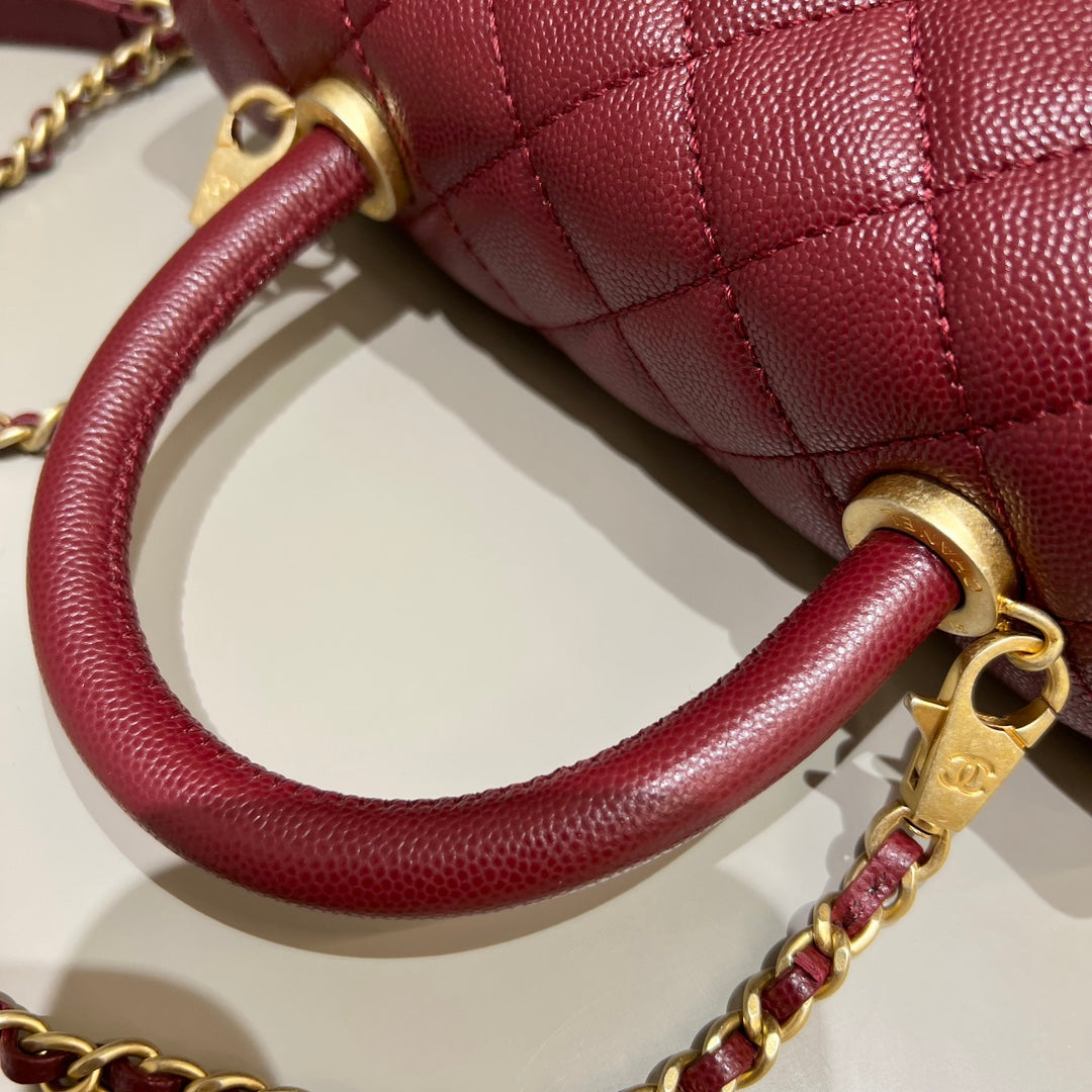 CH  FLAP BAG WITH TOP HANDLE 24  Small Grained Calfskin Red Wine Color