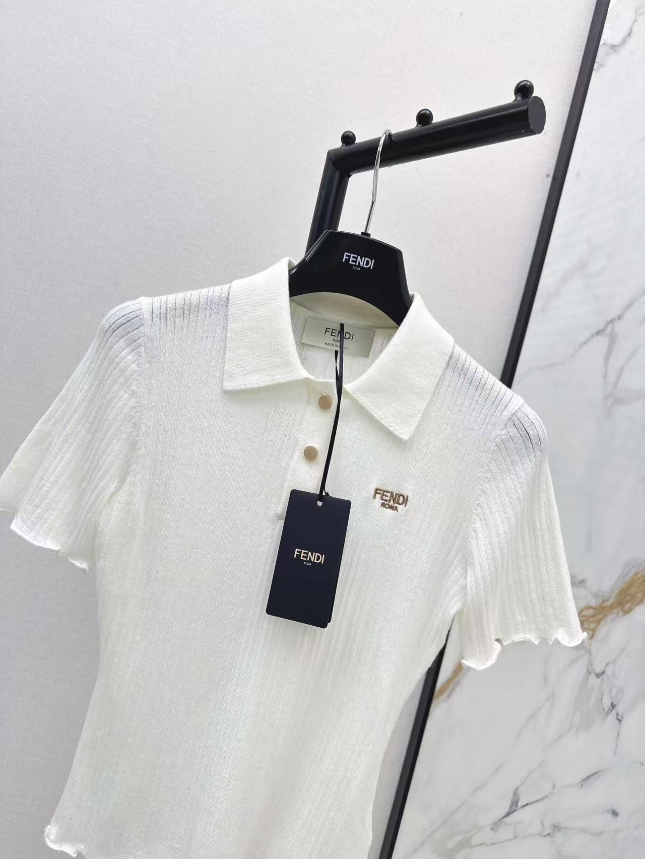Fe 25ss knitted polo shirt