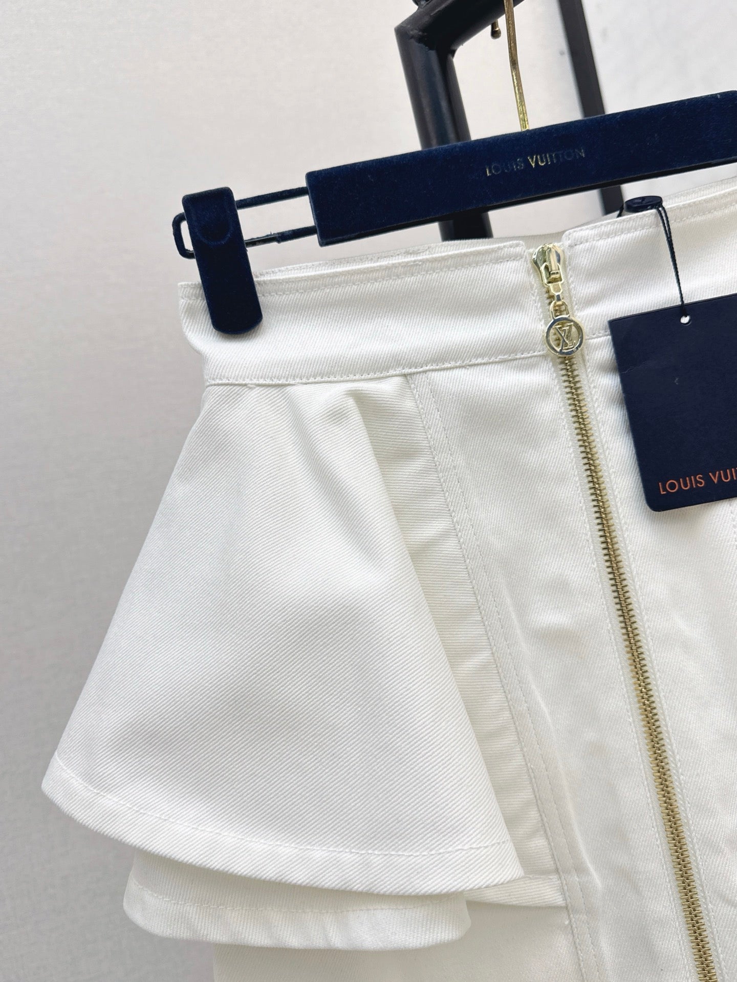 L 25ss ruffle denim skirt