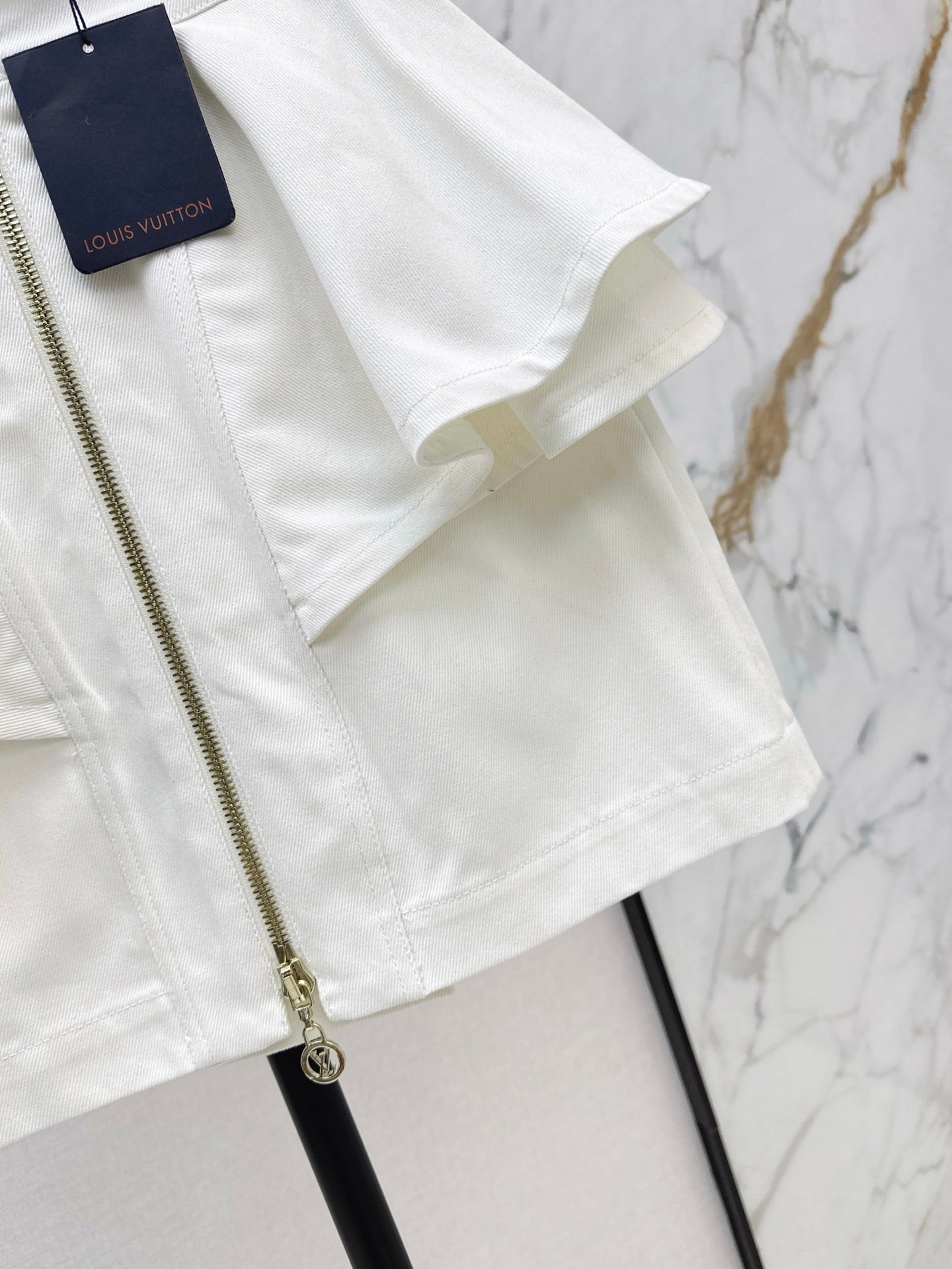 L 25ss ruffle denim skirt