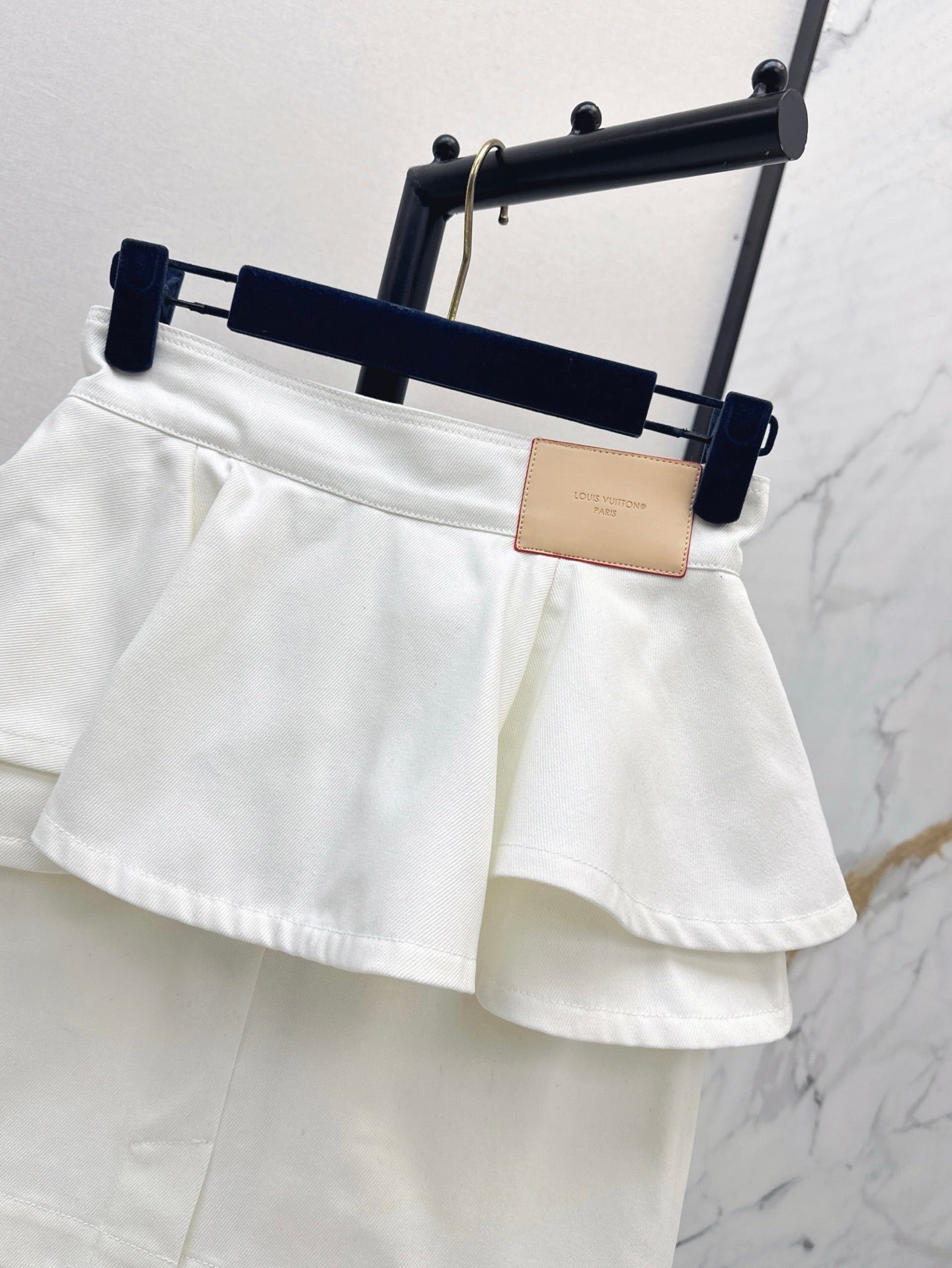 L 25ss ruffle denim skirt