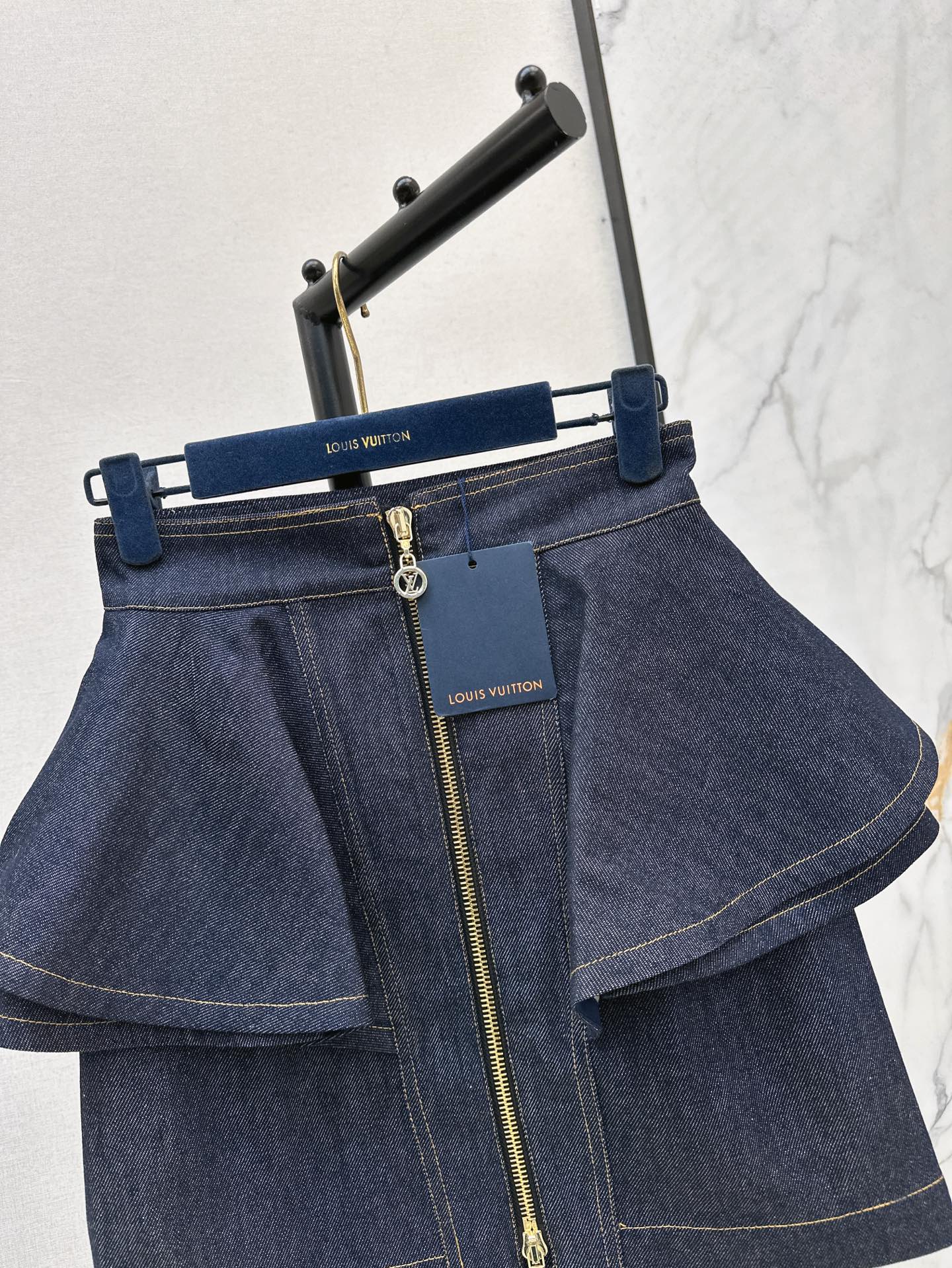 L 25ss ruffle denim skirt