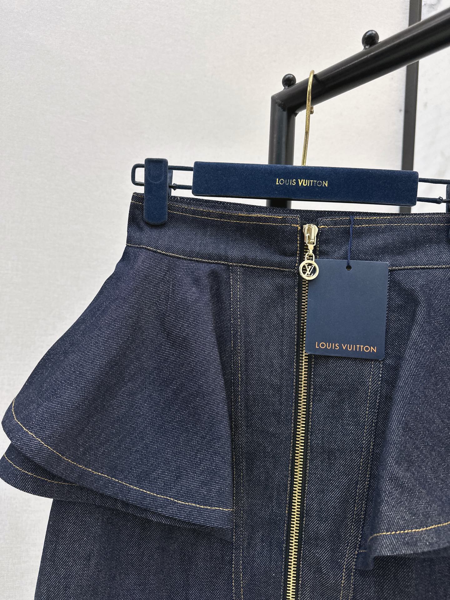 L 25ss ruffle denim skirt