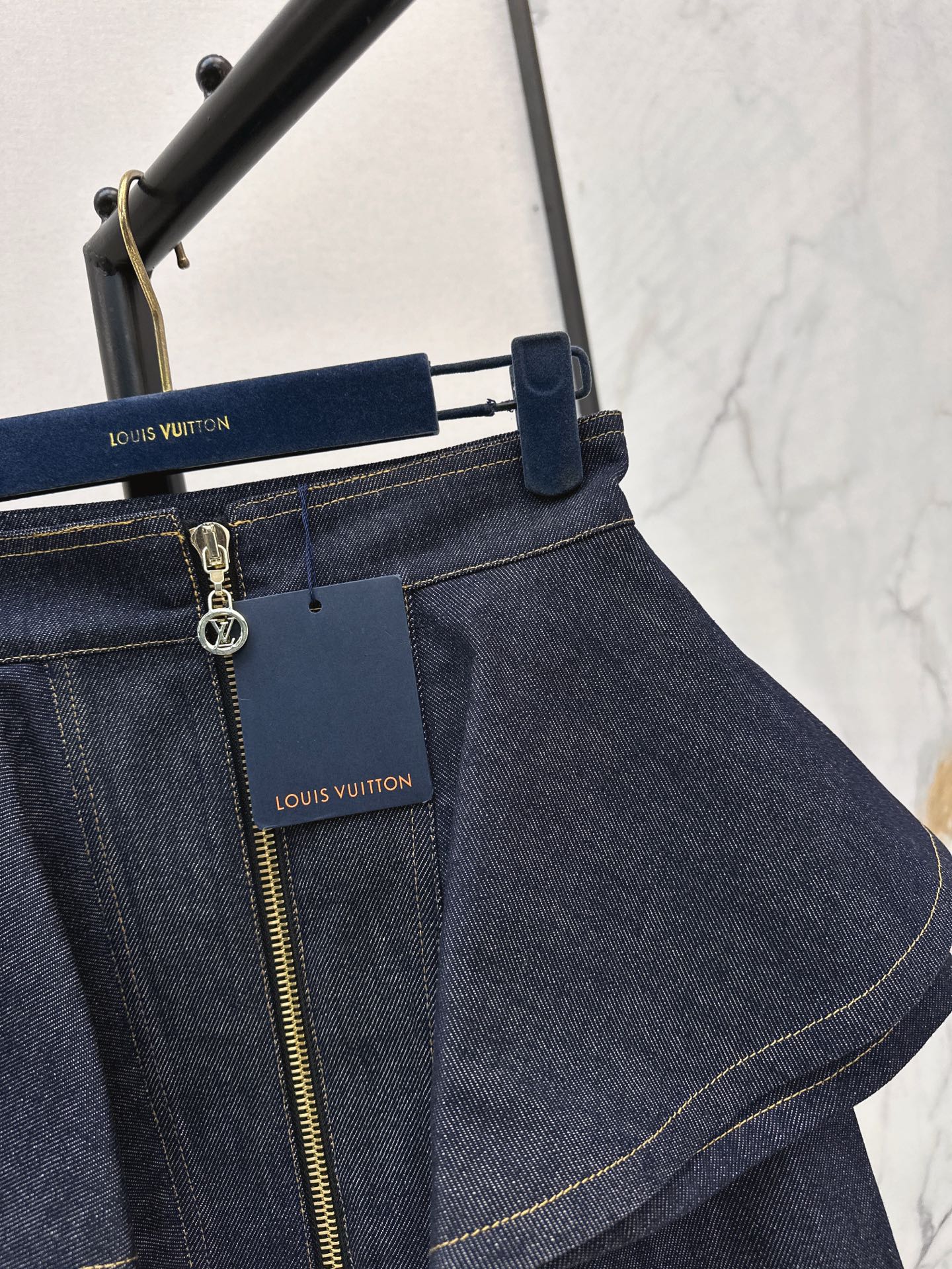 L 25ss ruffle denim skirt