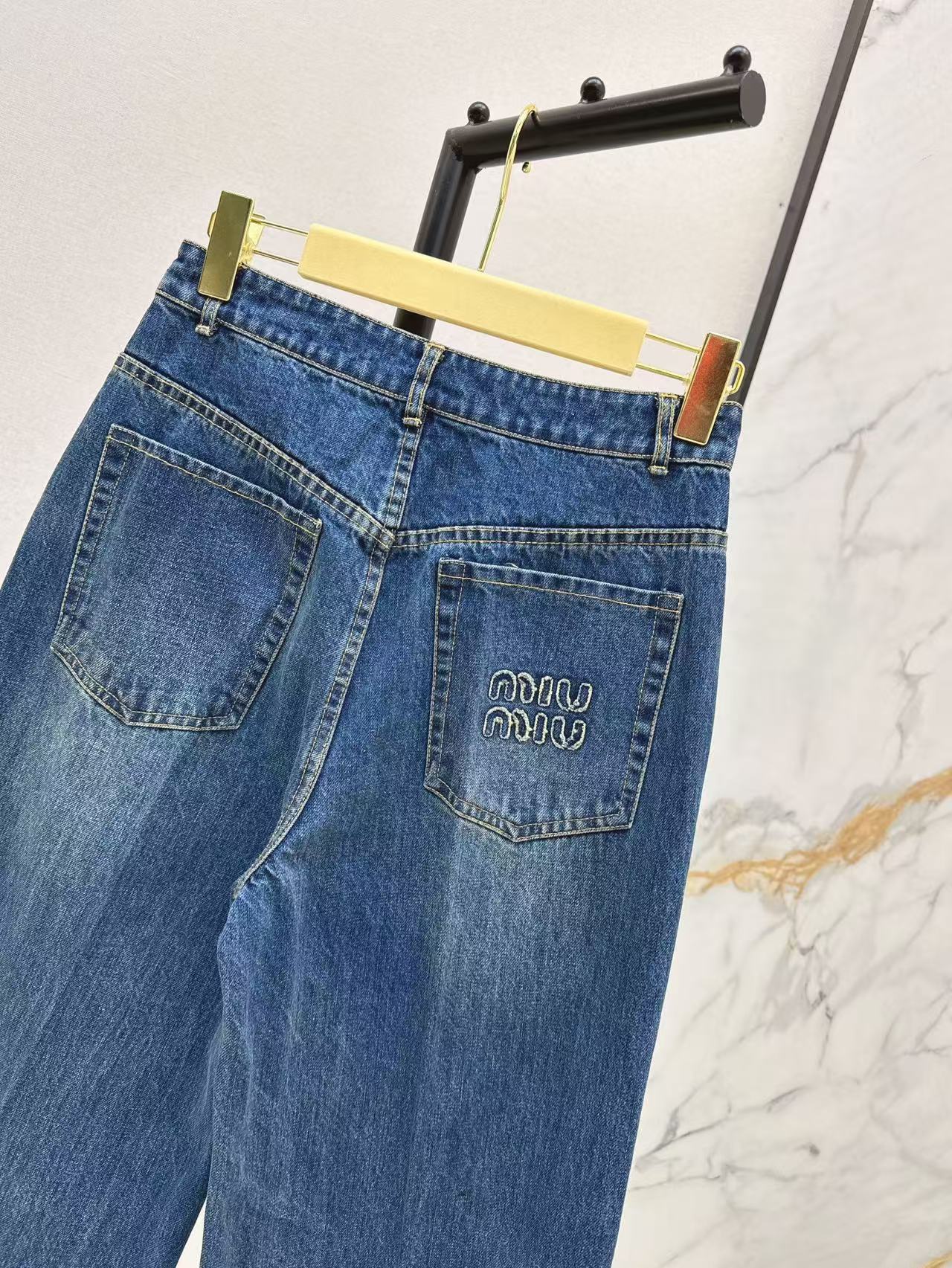 M 25ss embroidered jeans
