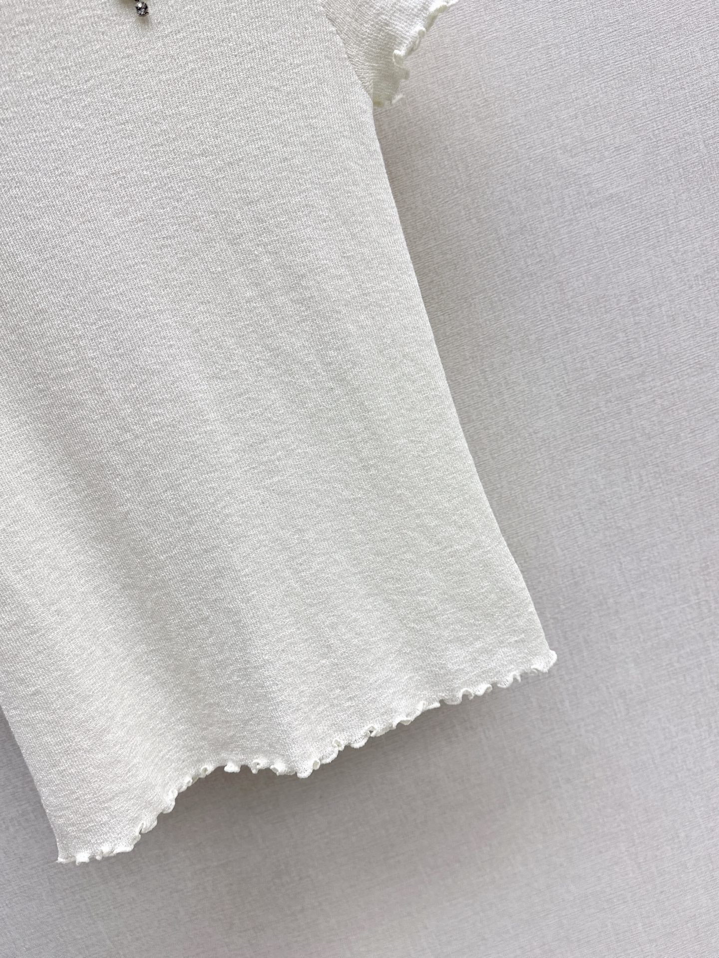 CE 25SS ruffle knit shirt