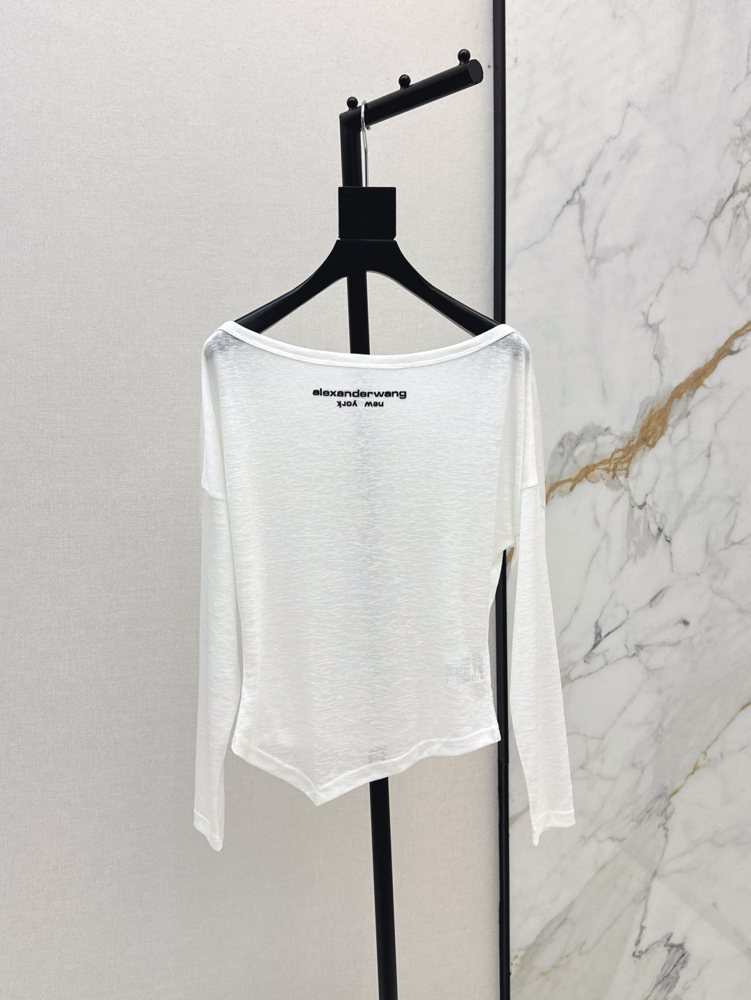 Wang 25ss off-shoulder shirt