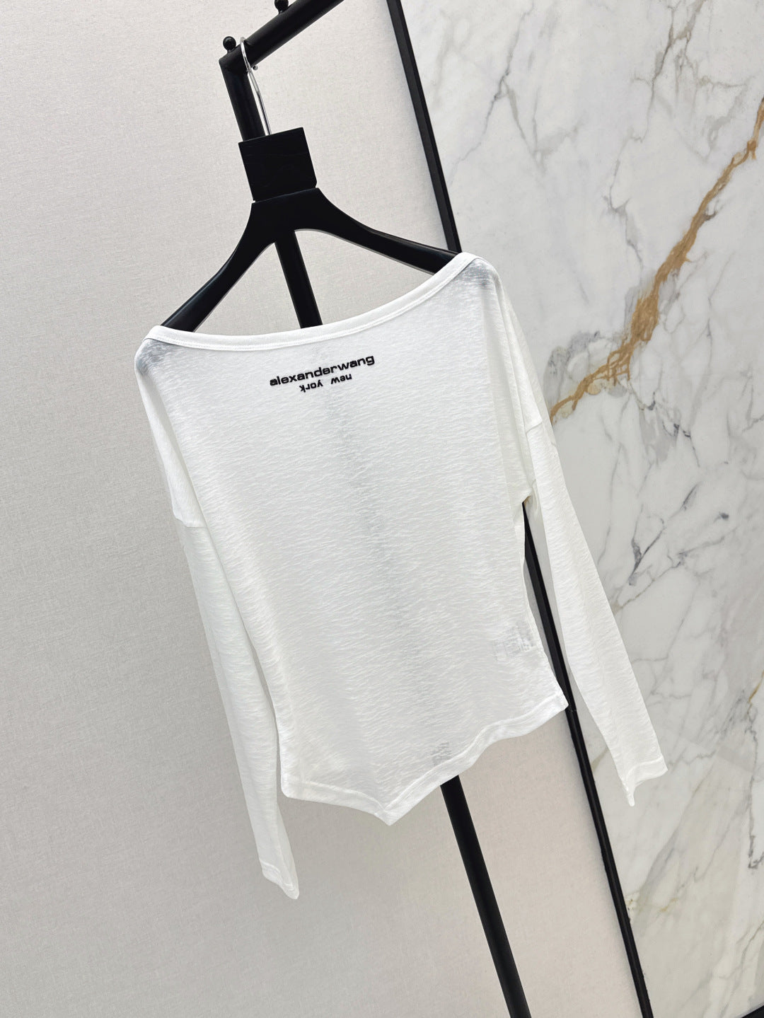 Wang 25ss off-shoulder shirt