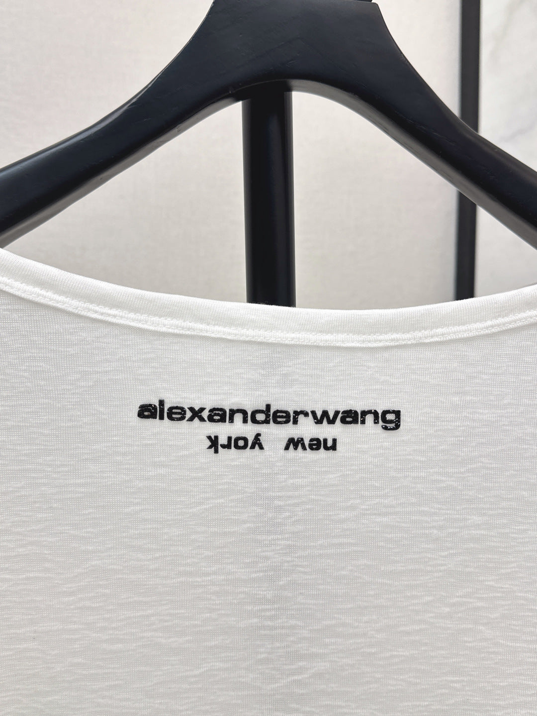 Wang 25ss off-shoulder shirt