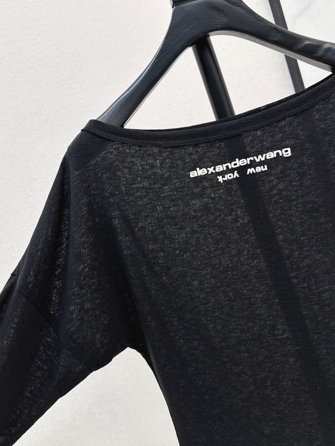 Wang 25ss off-shoulder shirt