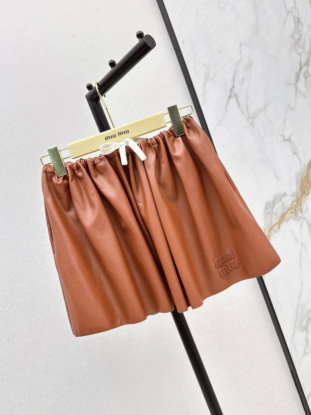 Miu 25ss leather skirt