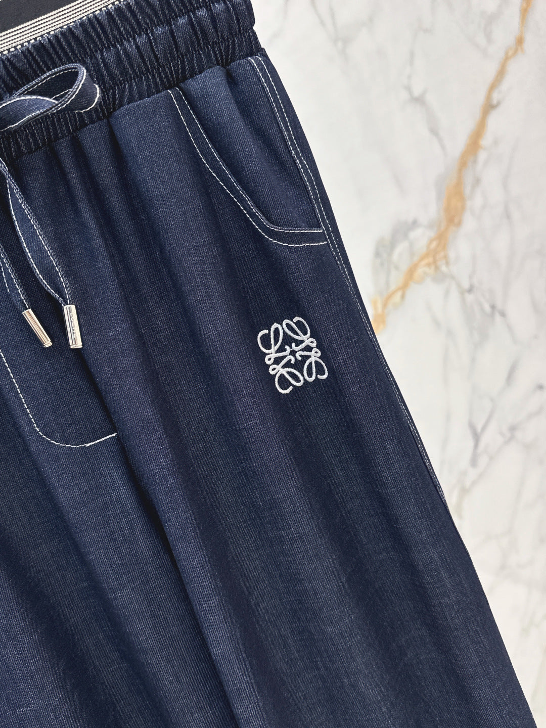 Loe 25fw embroidered jeans