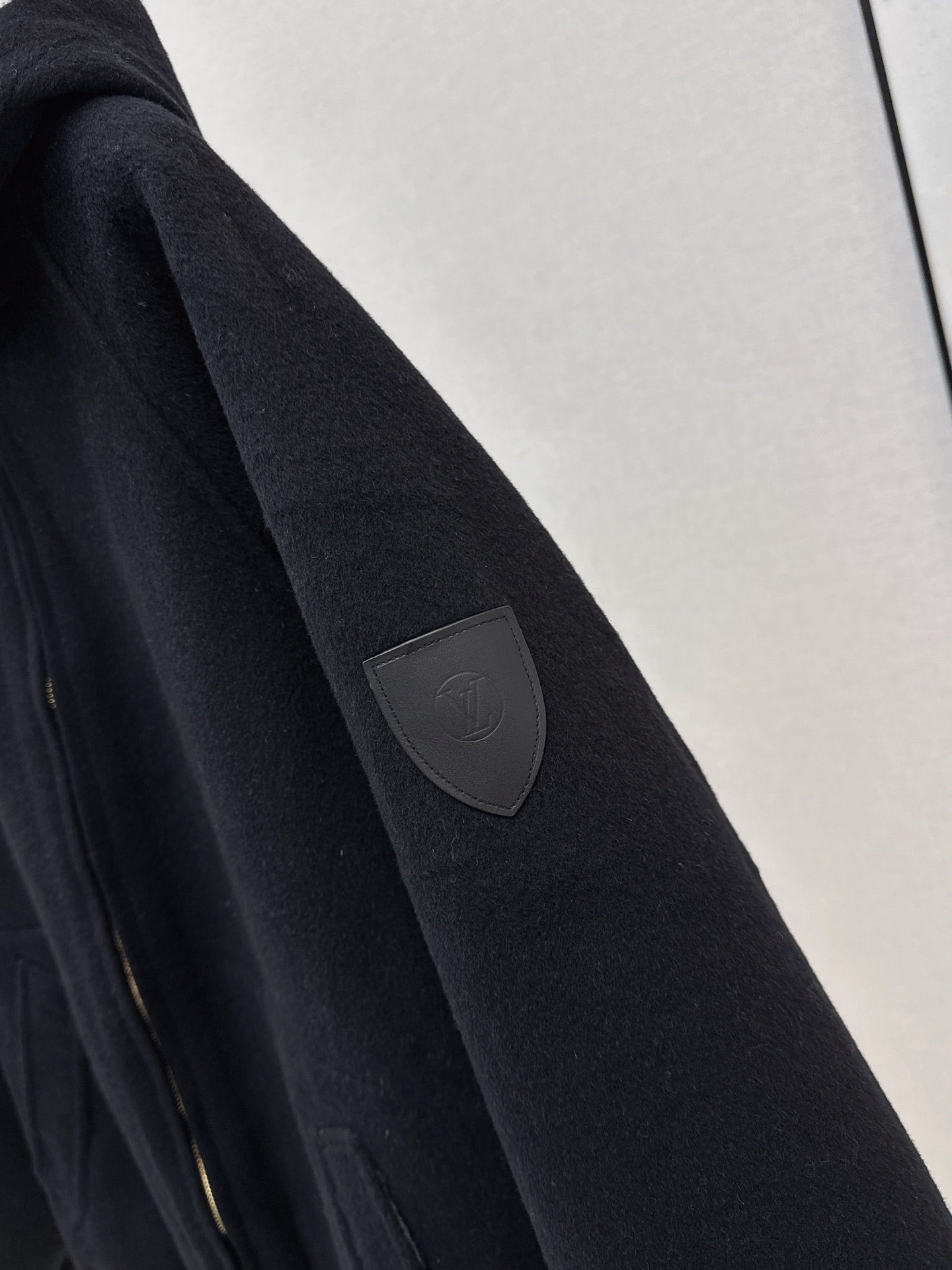 Loui 25fw reversible hooded jacket