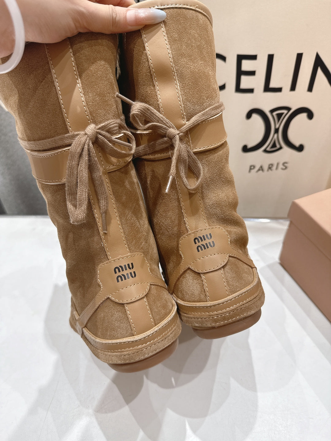 Miu fleece-lined lace-up boots