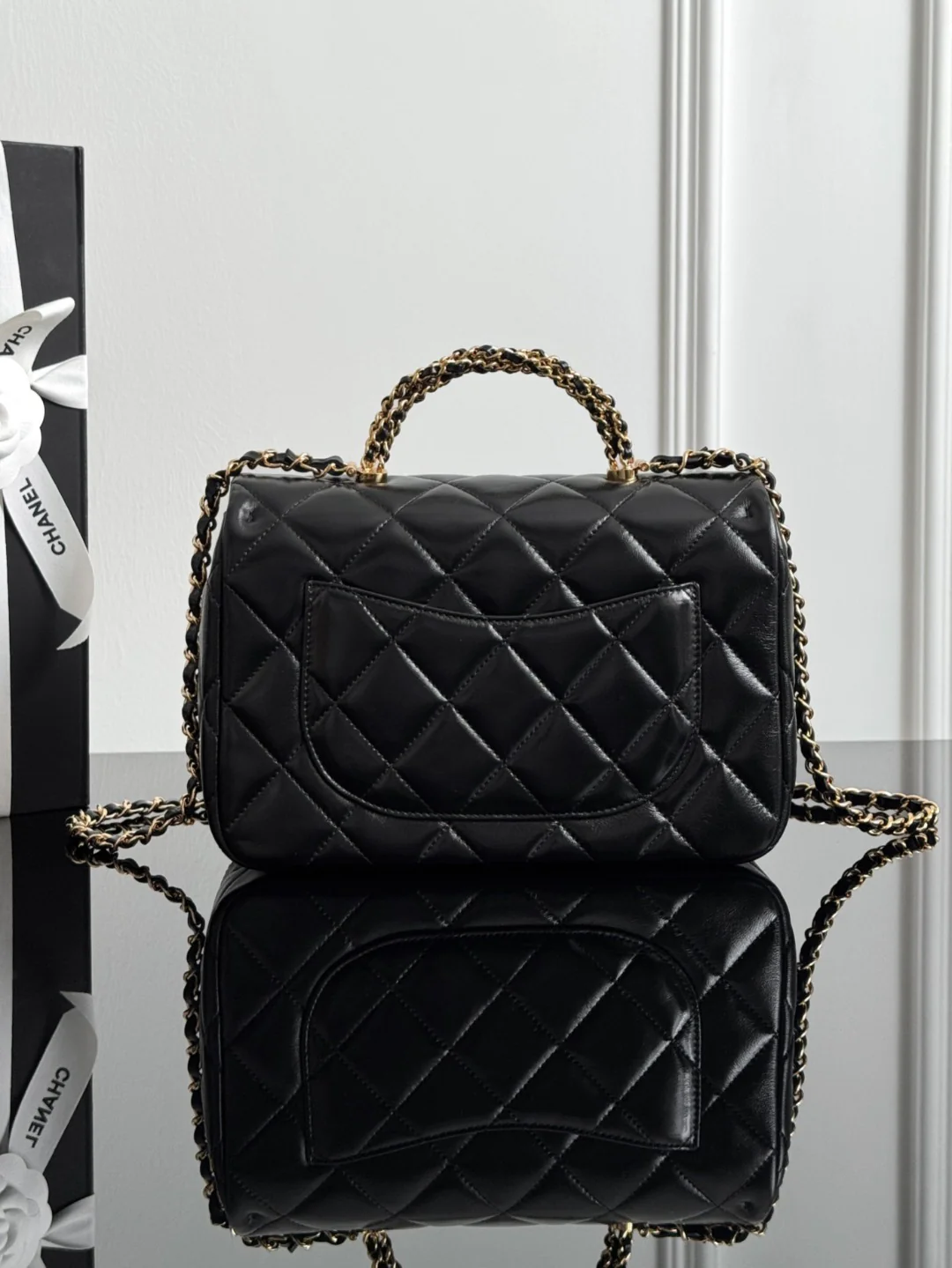 Chan 24B mini flap bag with top handle