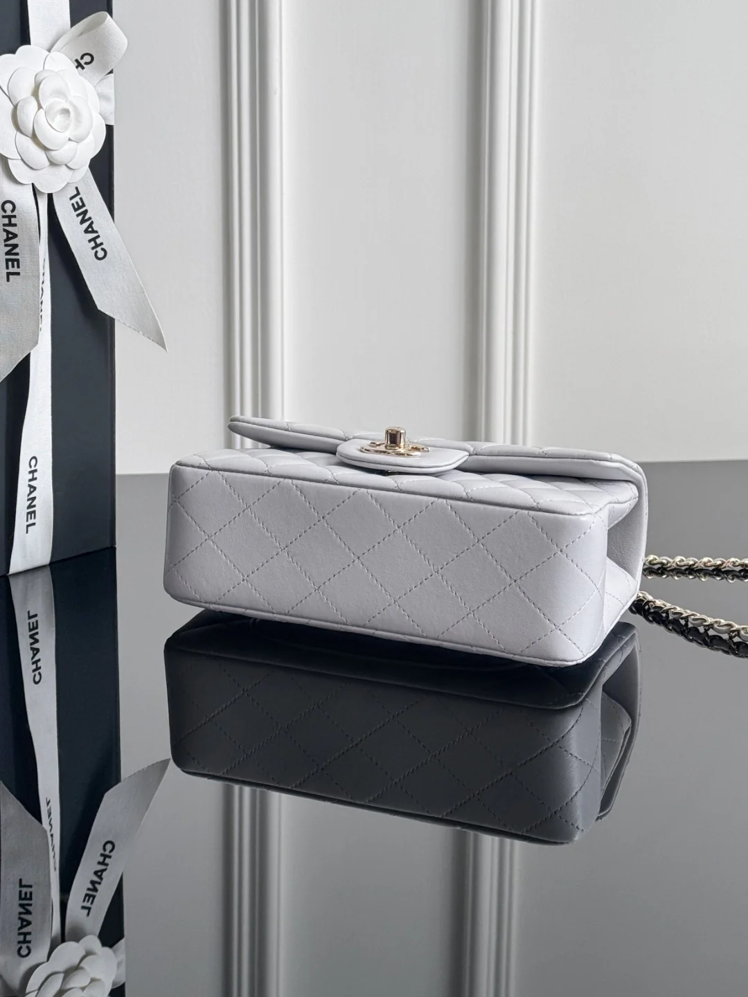 Chan 25P mini flap bag with top handle