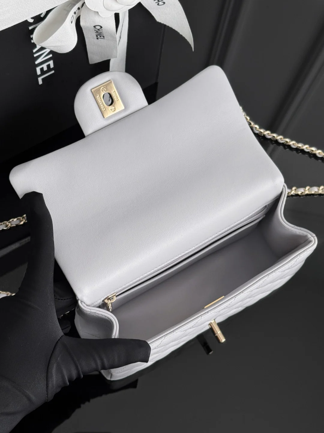Chan 25P mini flap bag with top handle