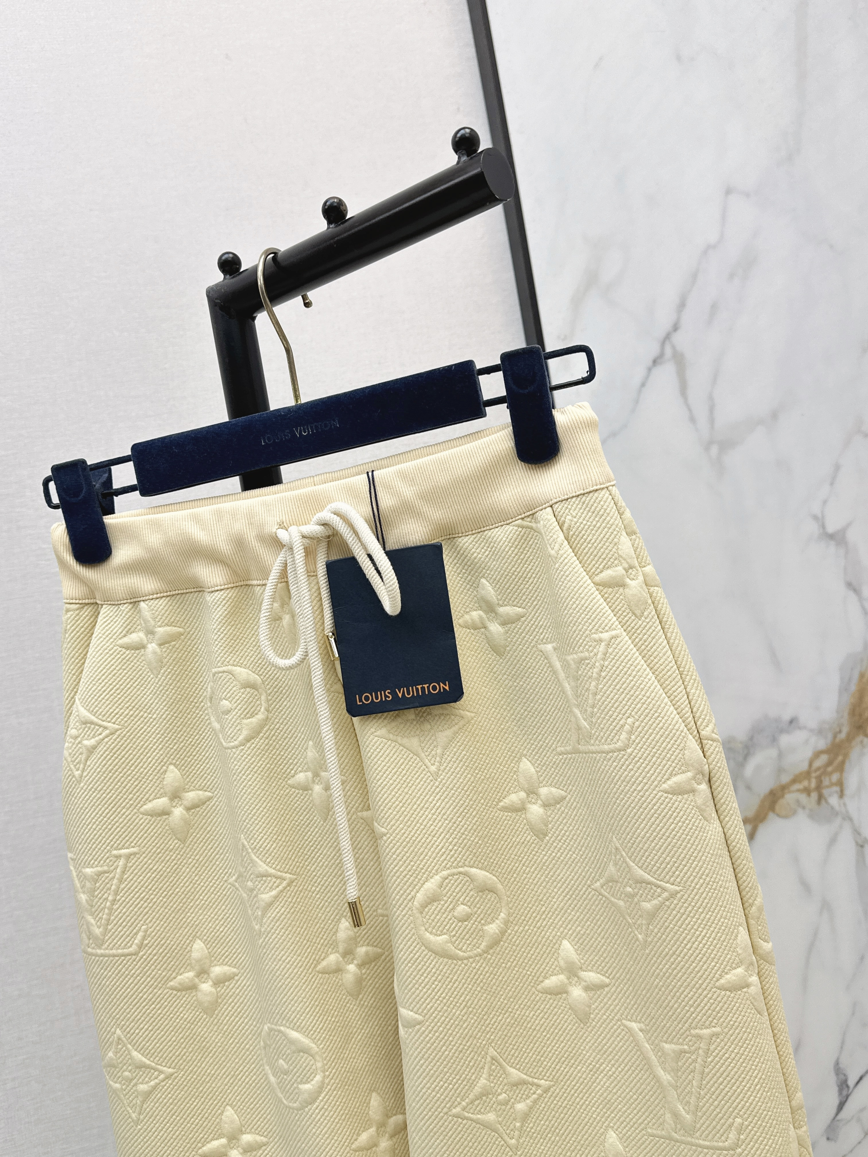 Loui 26ss embossed pants
