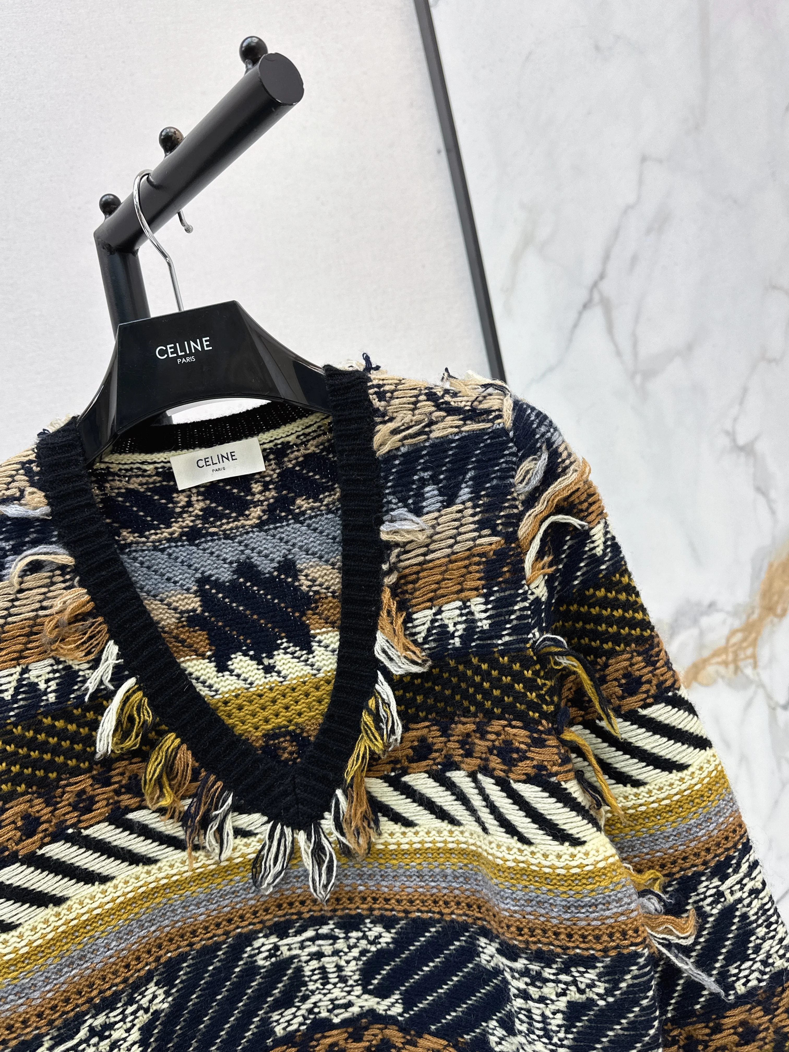 Celi 26ss tassel knit sweater