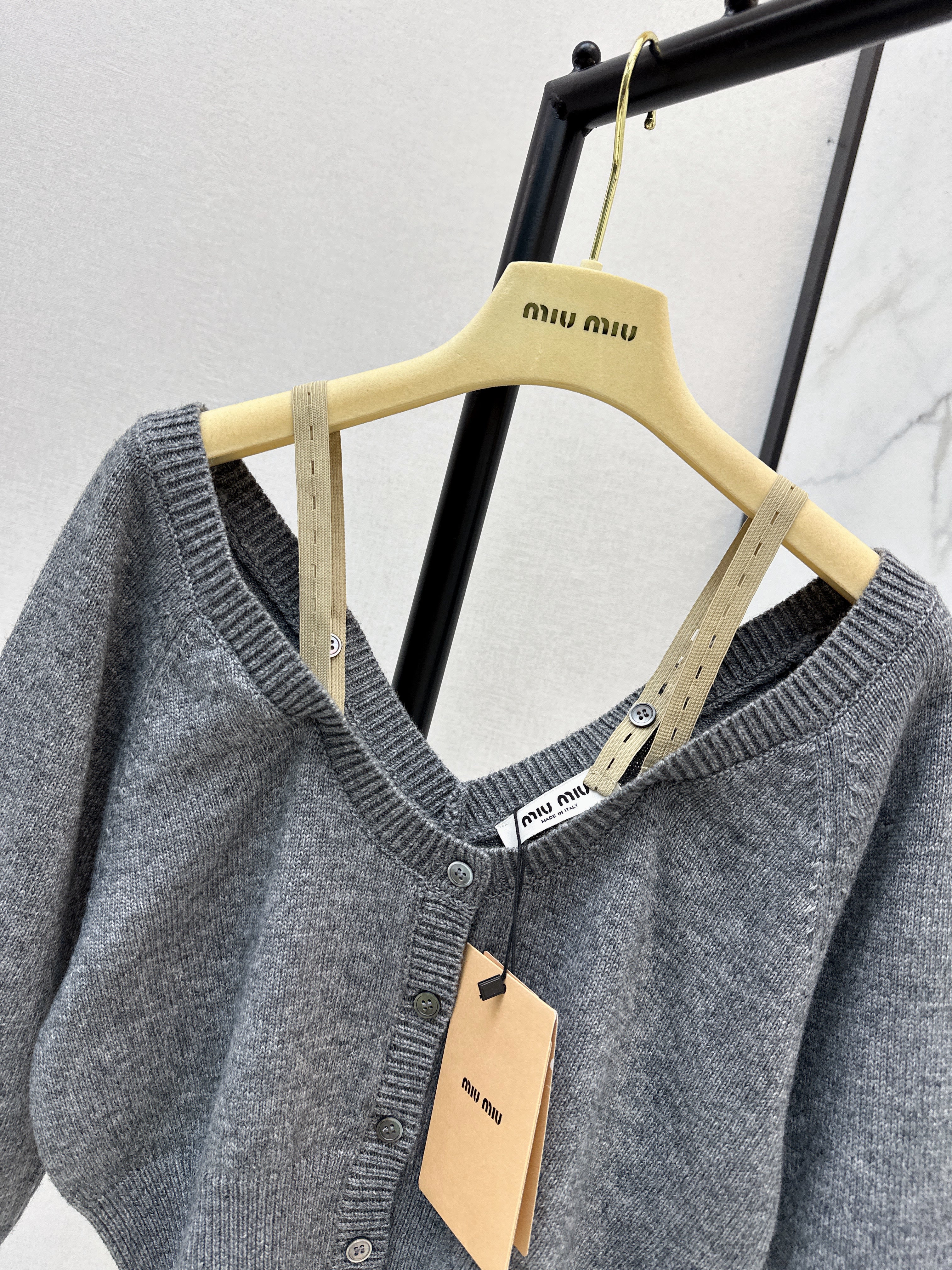 Miu 26ss off shoulder knit cardigan
