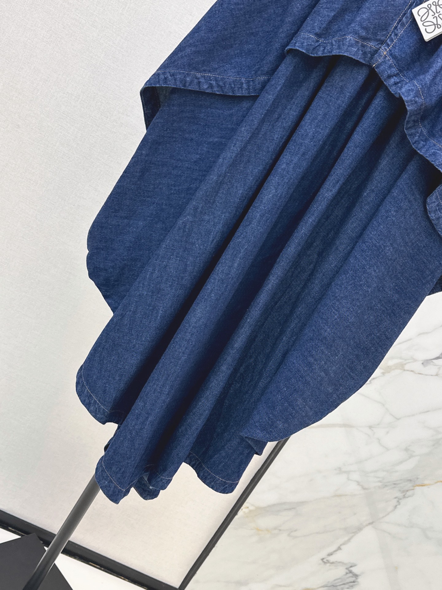 Loe 26ss asymmetrical ruffle denim skirt