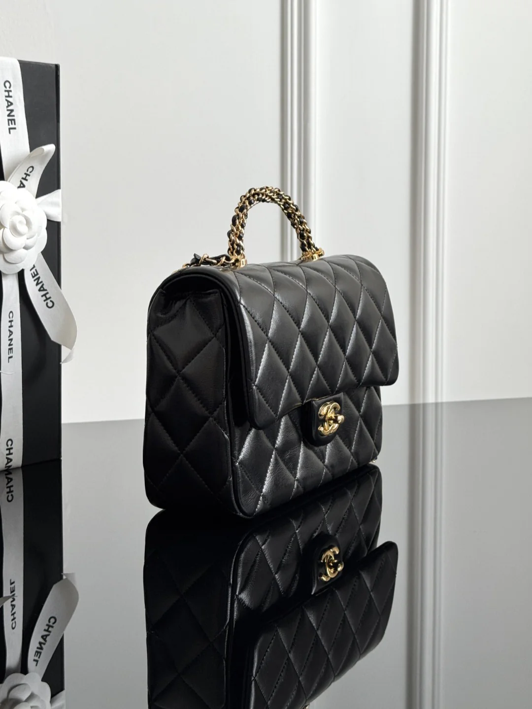 Chan 24B mini flap bag with top handle