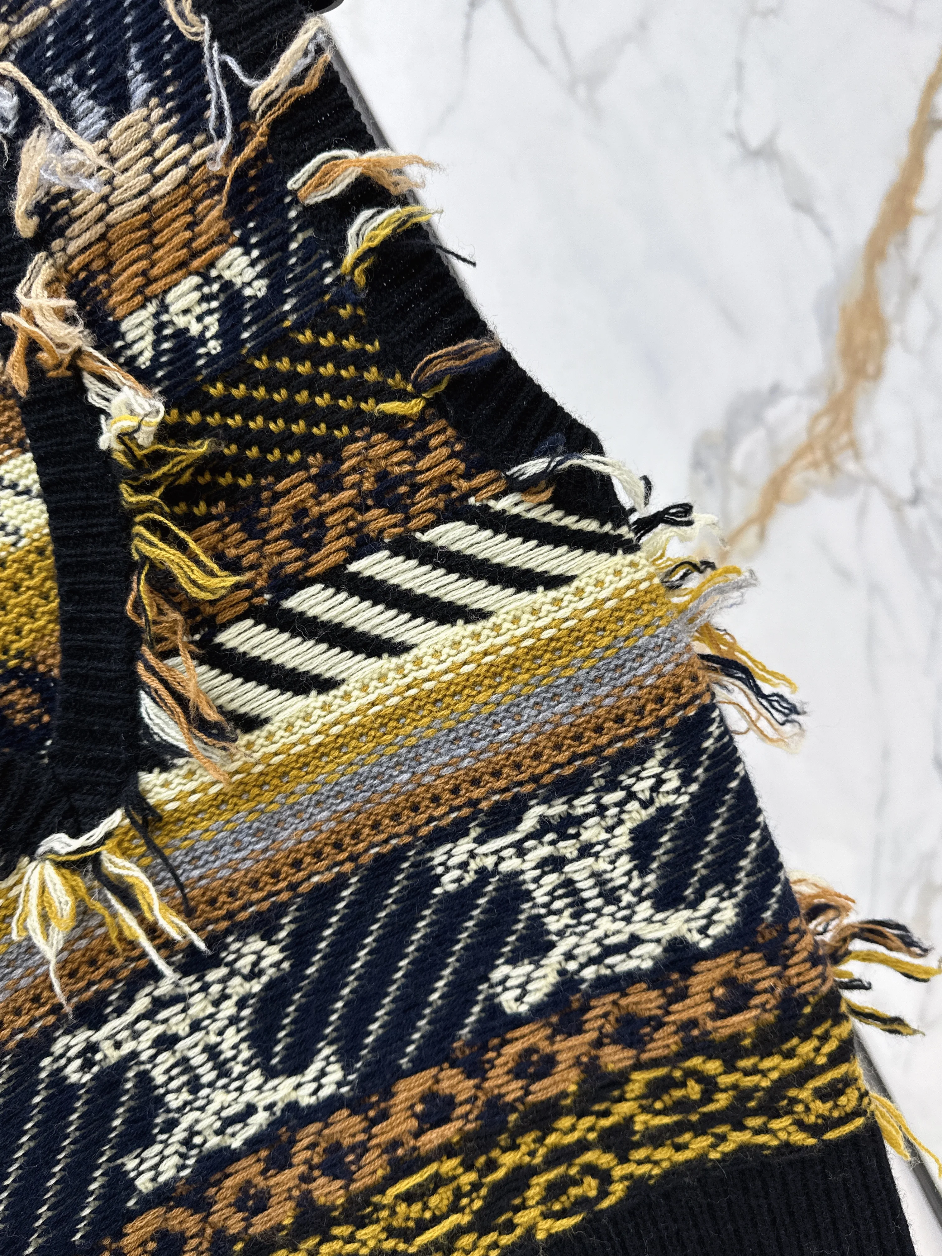 Celi 26ss tassel knit vest