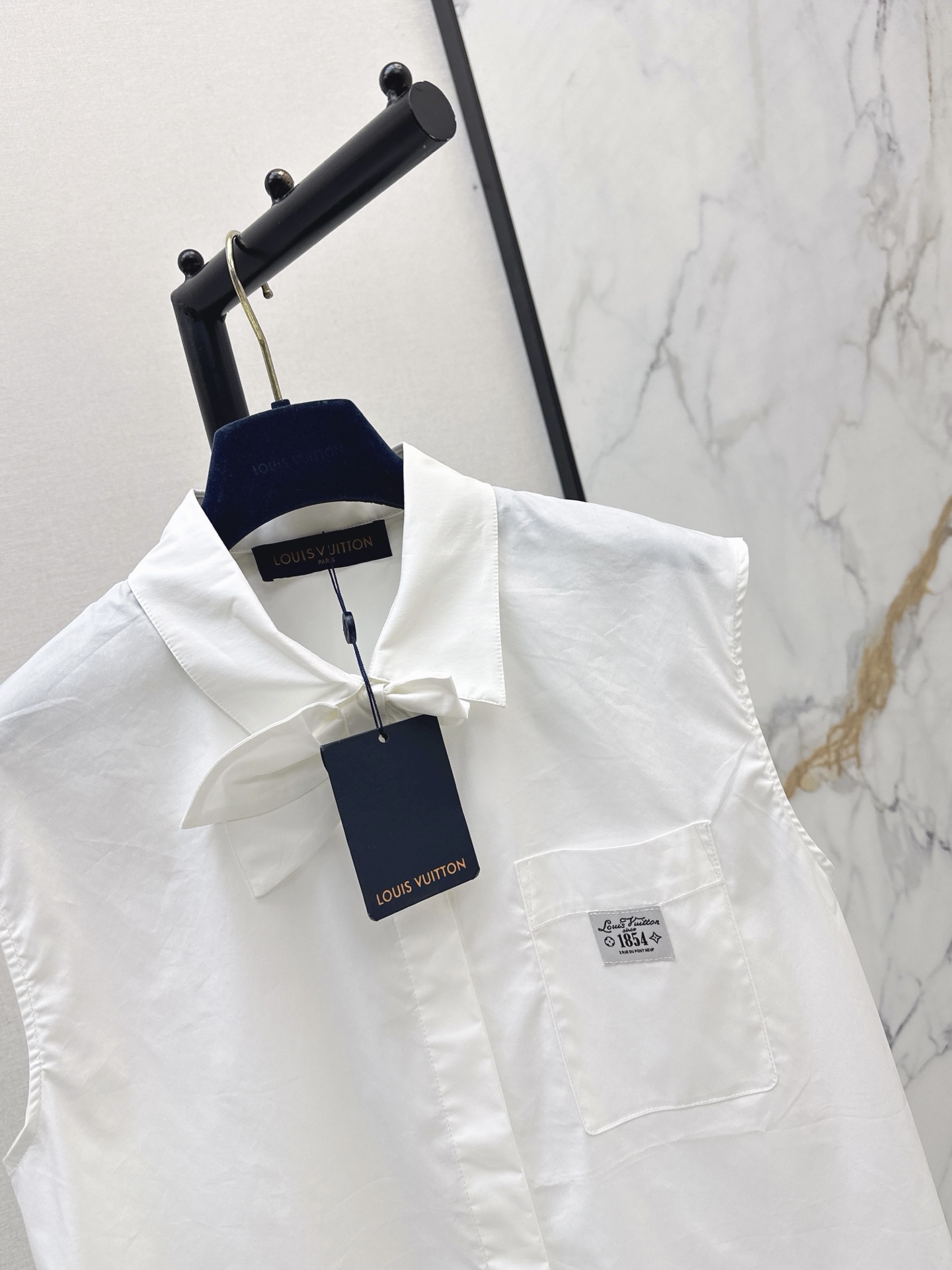 Loui 26ss sleeveless bow shirt