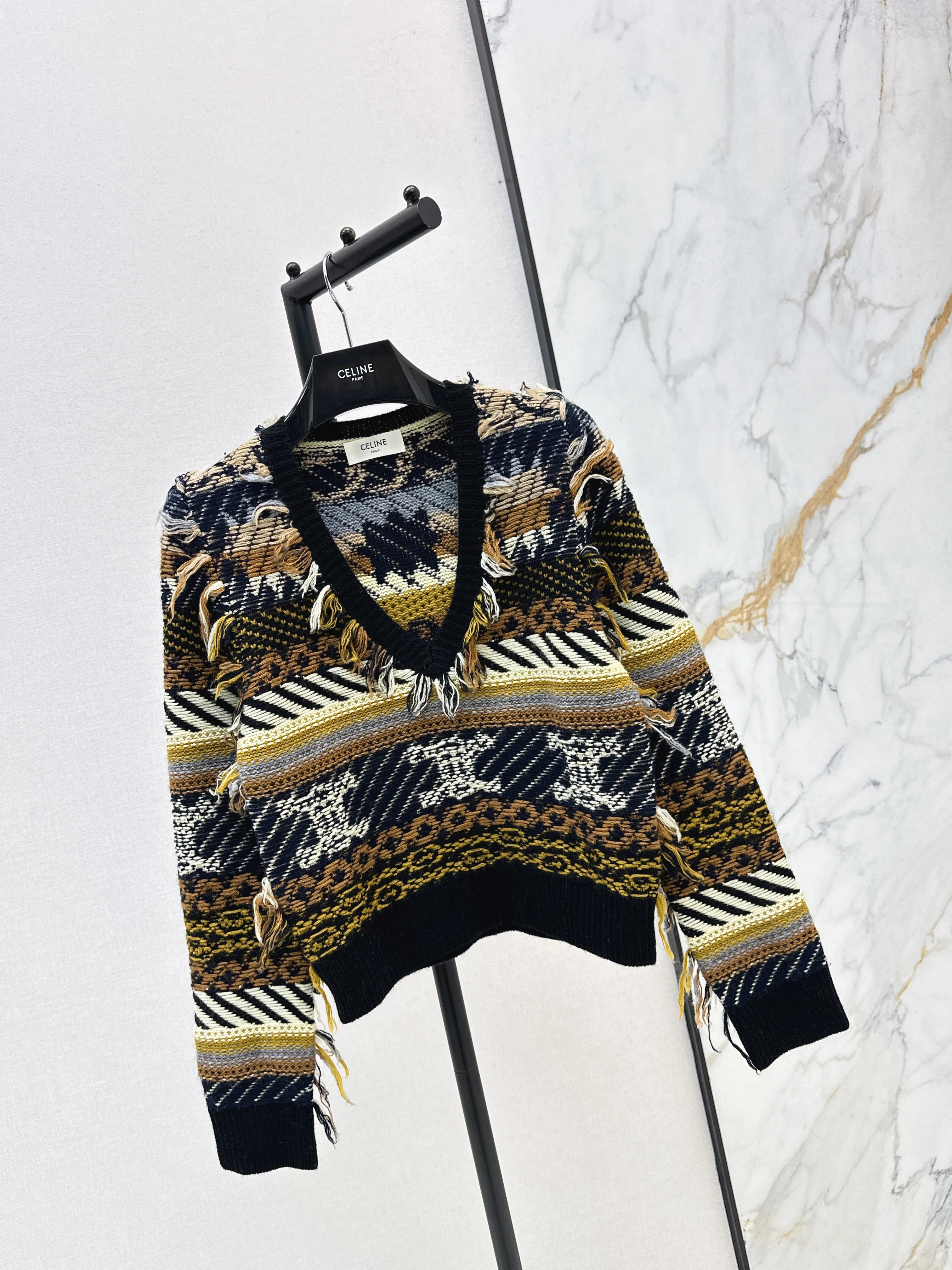 Celi 26ss tassel knit sweater