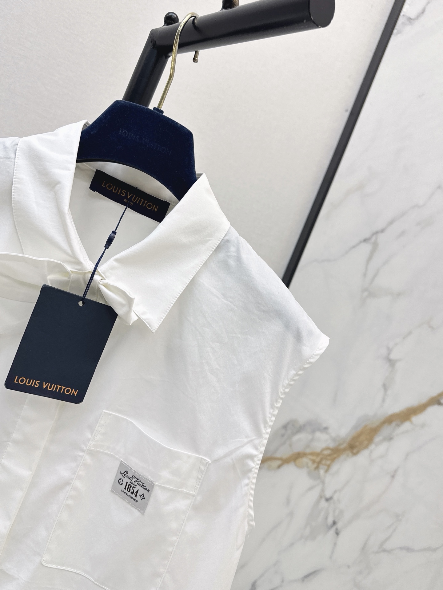 Loui 26ss sleeveless bow shirt