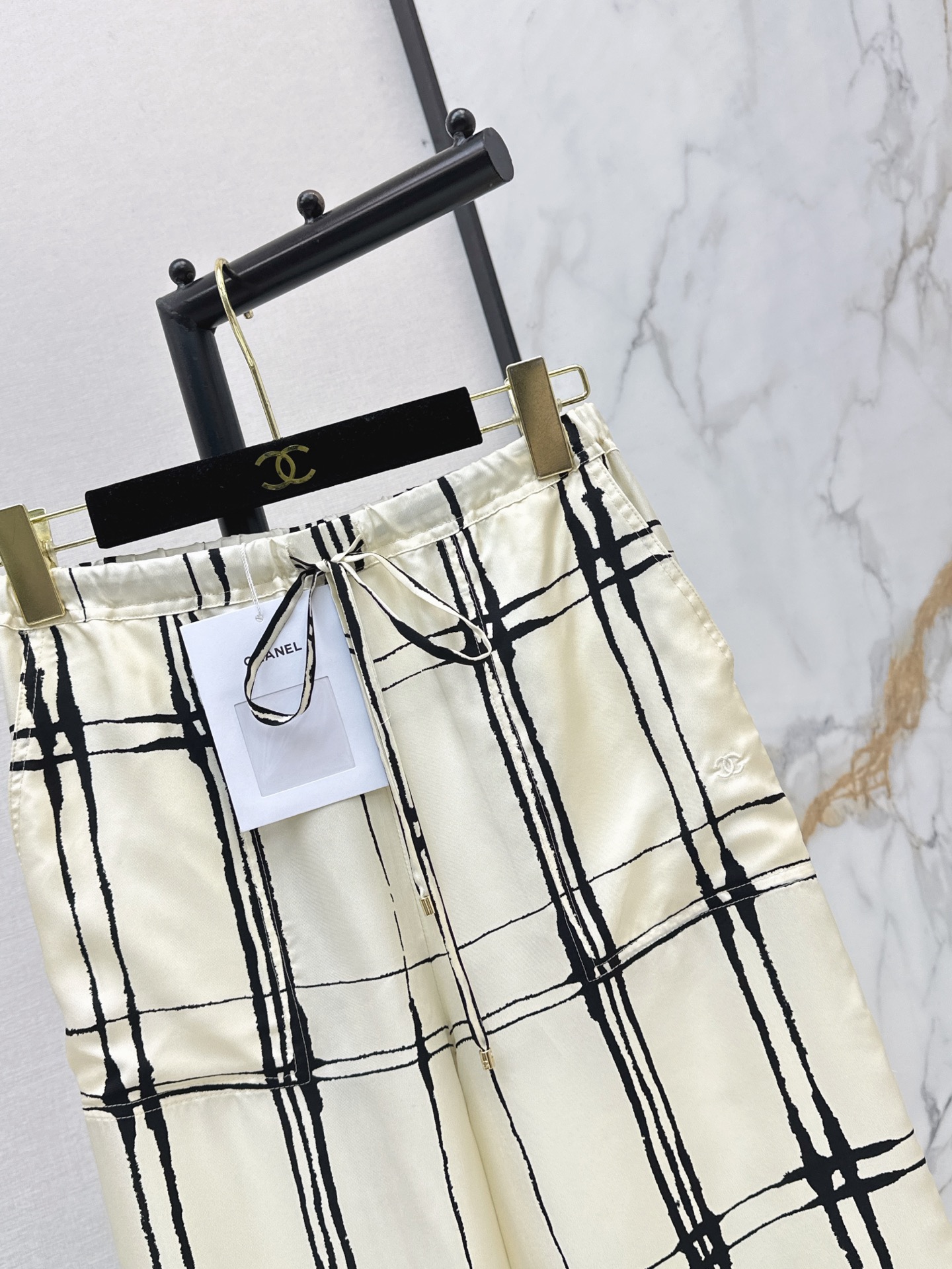 Chan 26ss check print silk pants