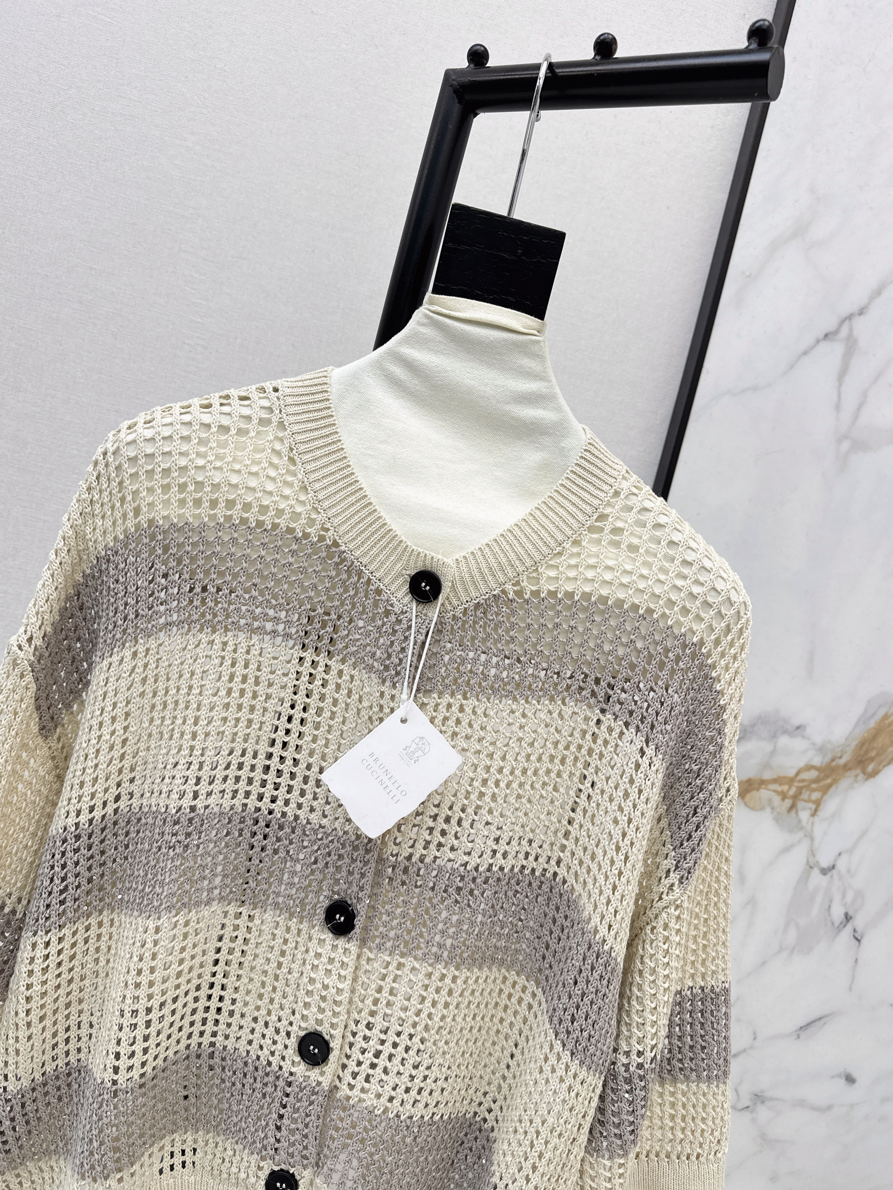 Brun 26ss hollow cardigan