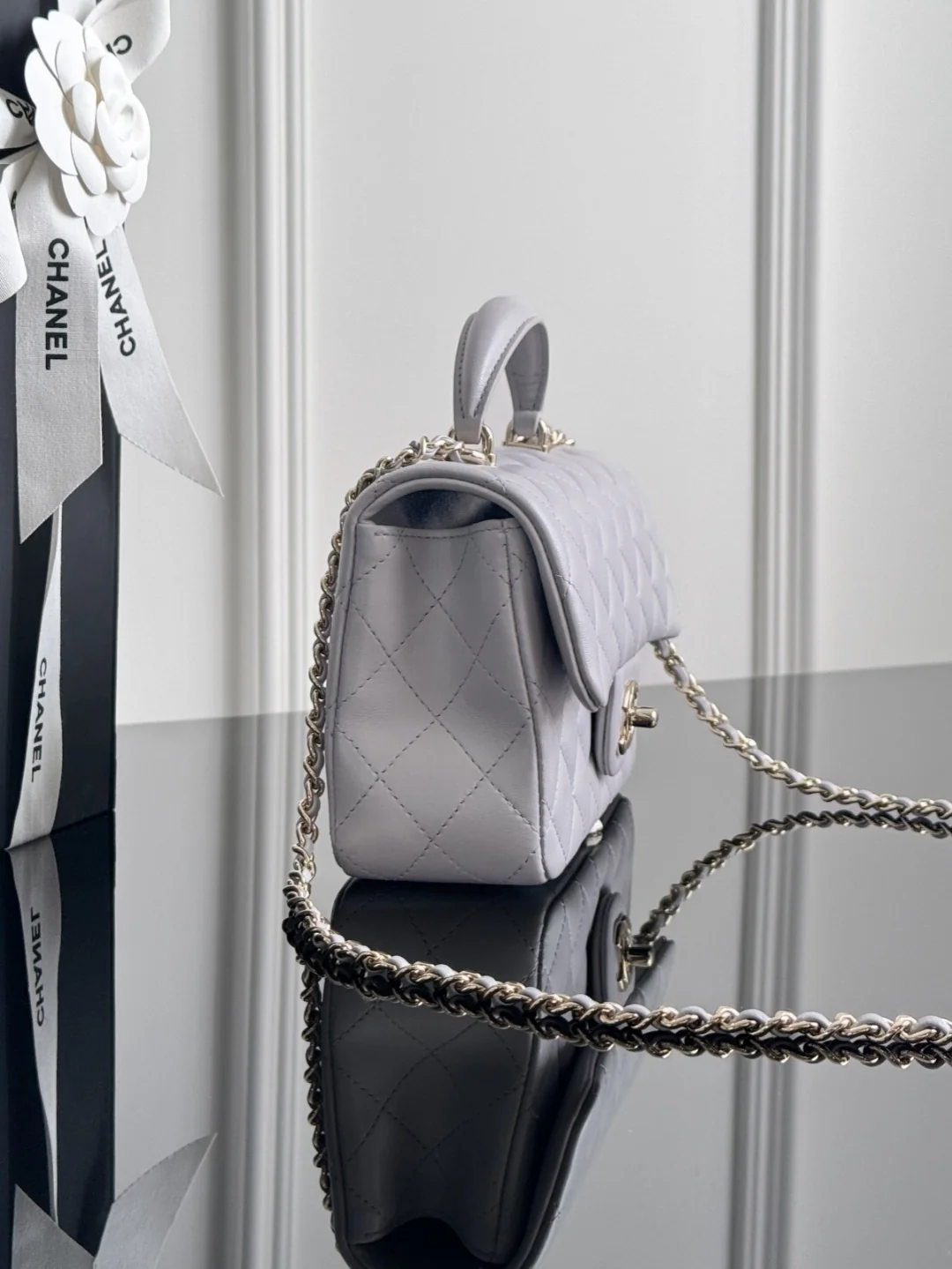 Chan 25P mini flap bag with top handle