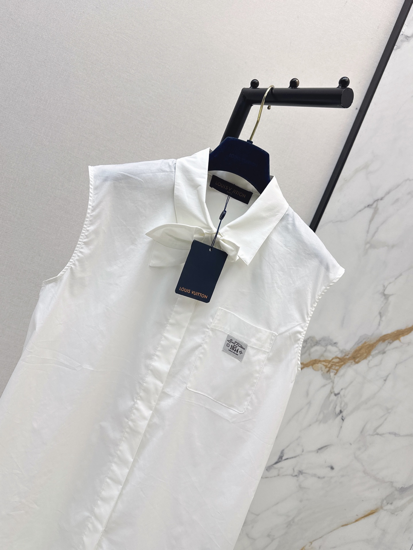 Loui 26ss sleeveless bow shirt