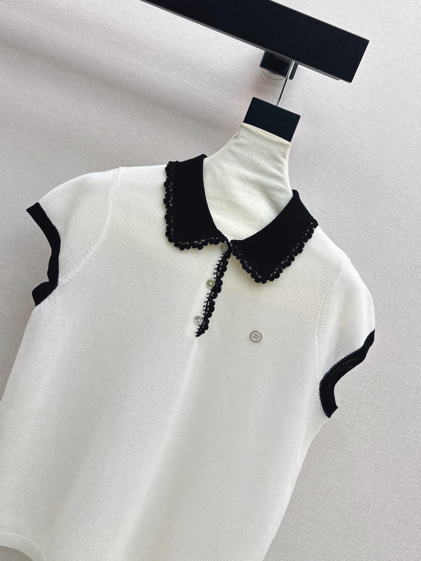 Miu 26ss sleeveless polo knitwear
