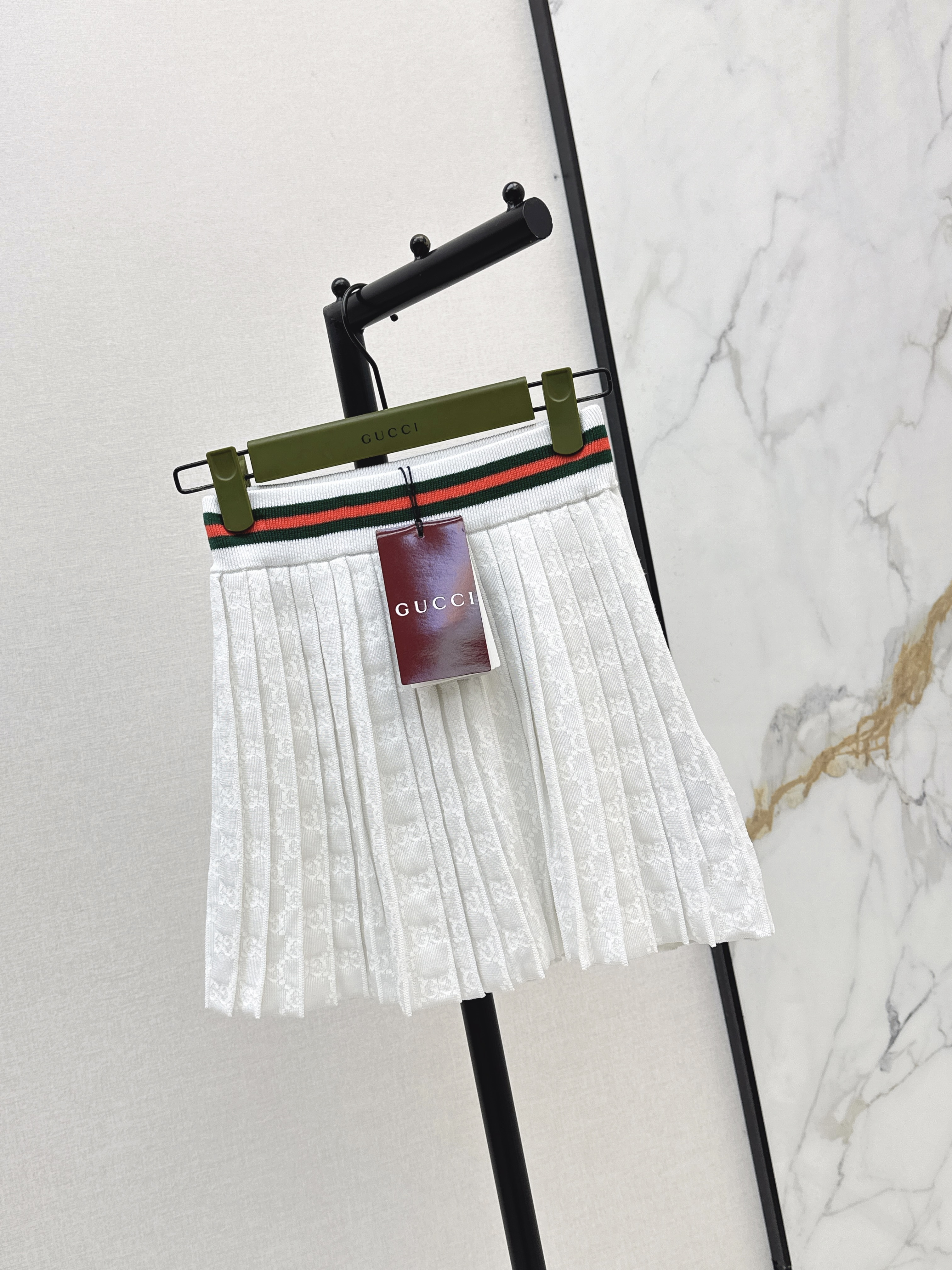 Guc 26ss jacquard pleated skirt