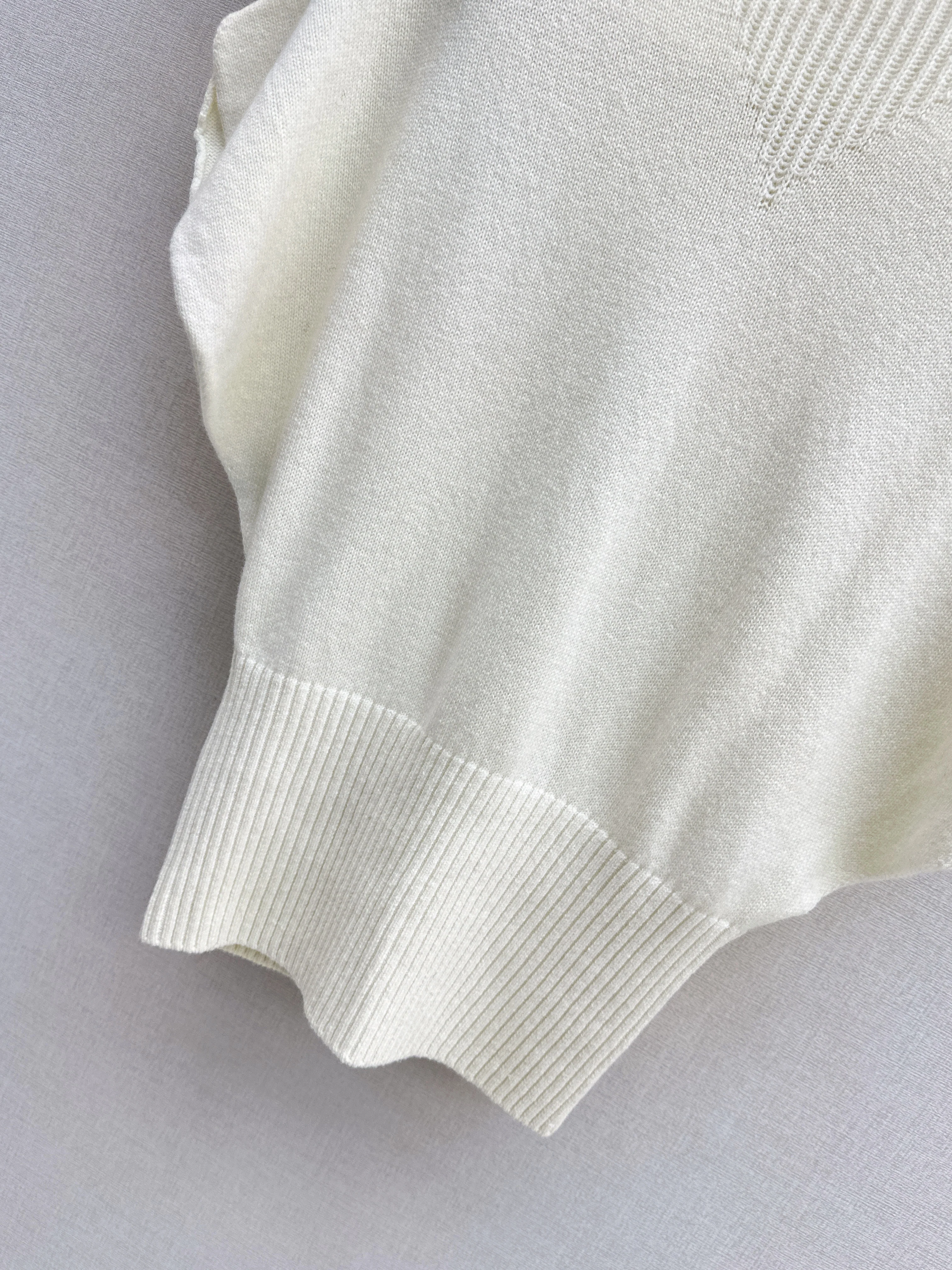 Brun 26ss sleeveless sweater with belted