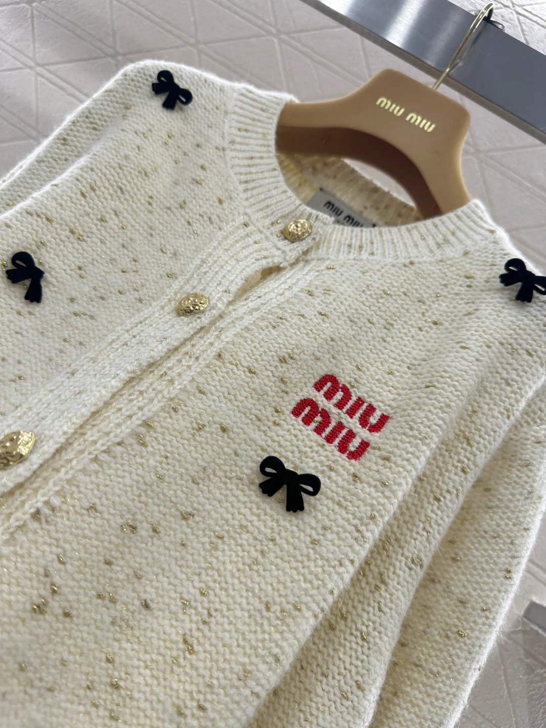 Miu 26ss 3d bow cardigan