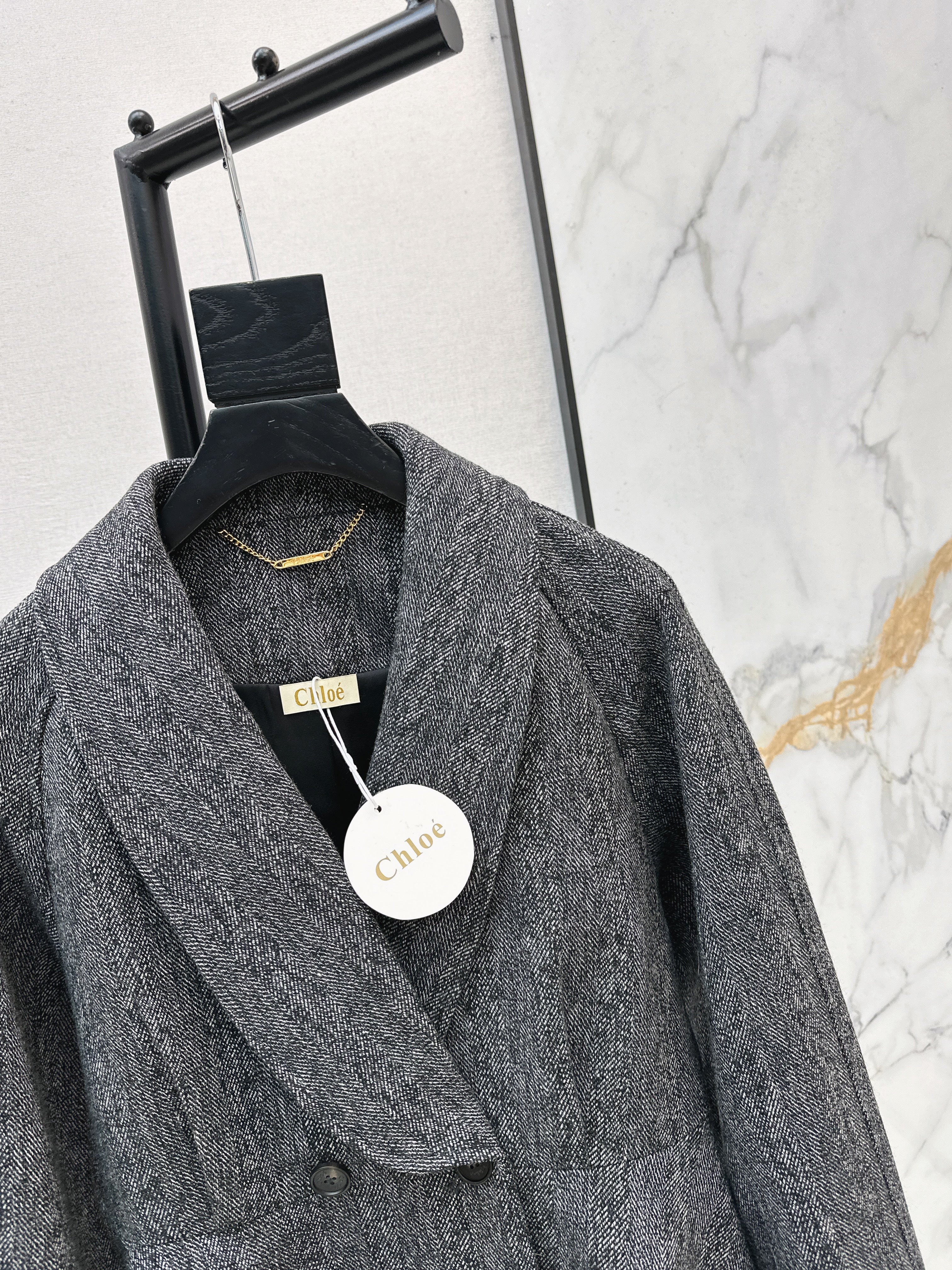 Chol 26ss ruffle-hem belted jacket