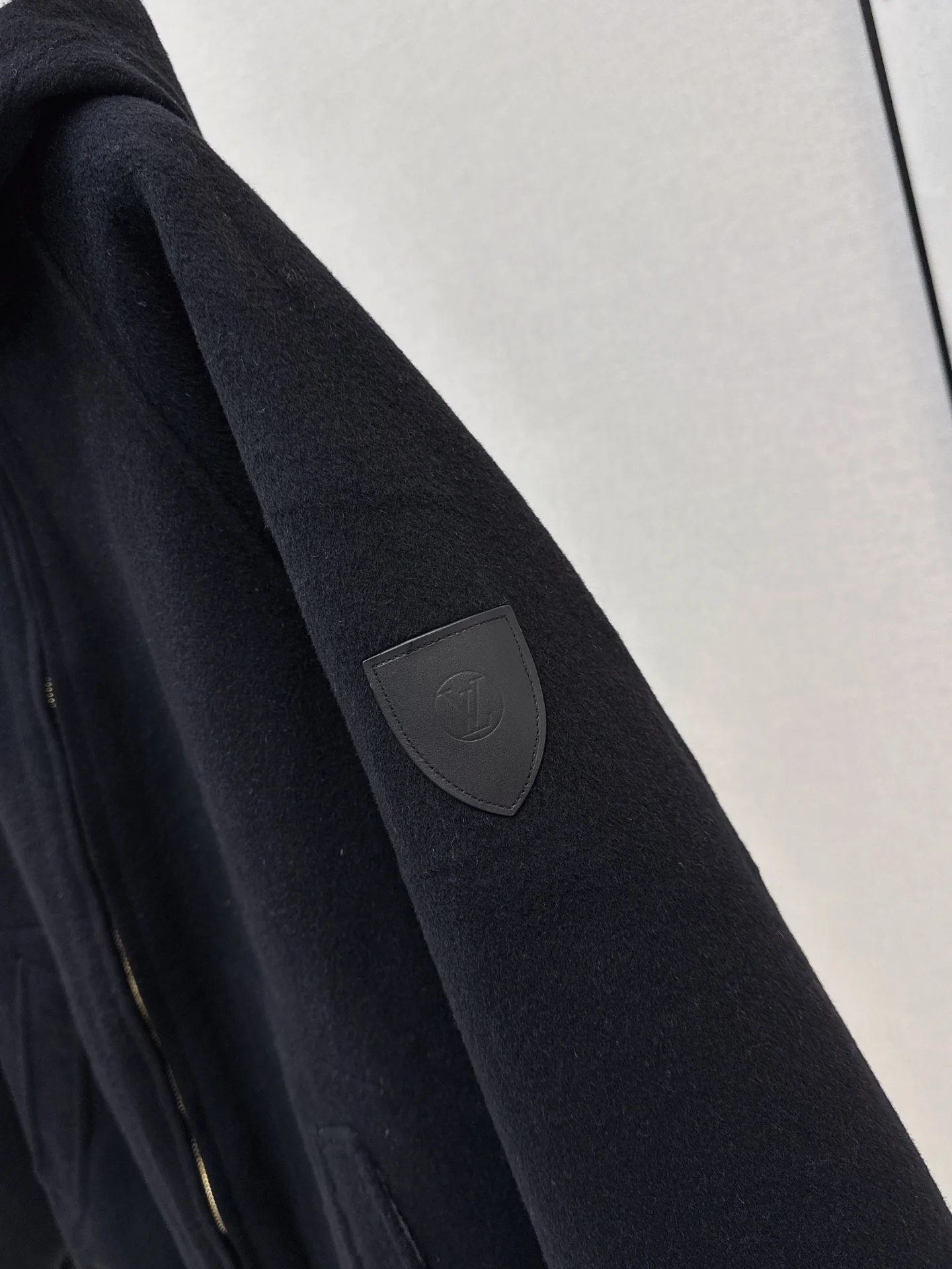 Loui 25fw reversible hooded jacket