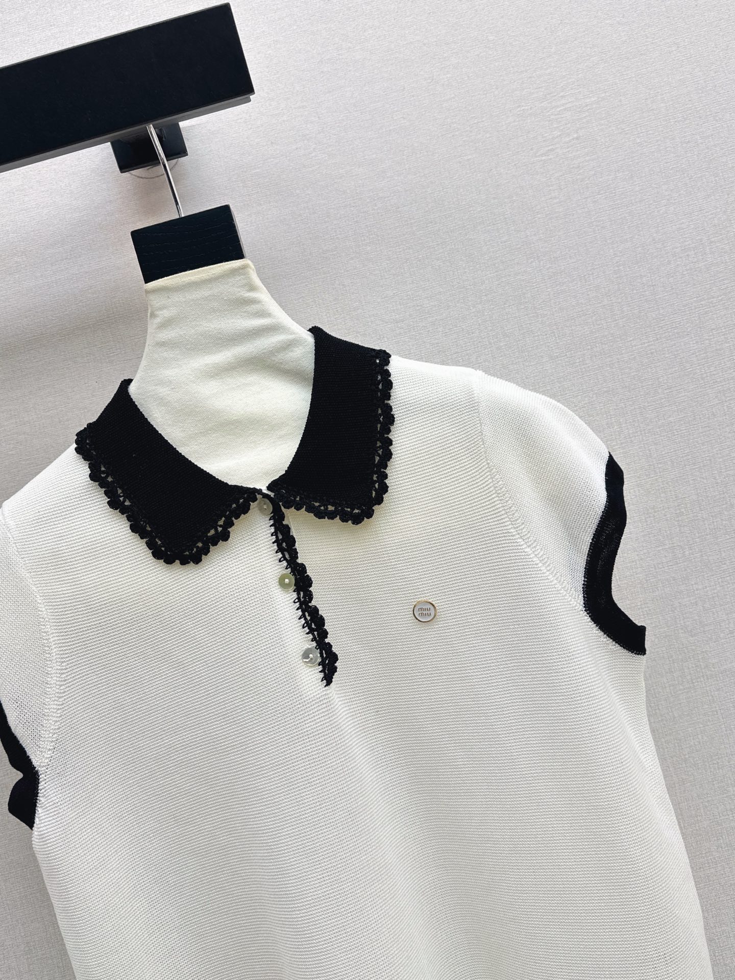 Miu 26ss sleeveless polo knitwear