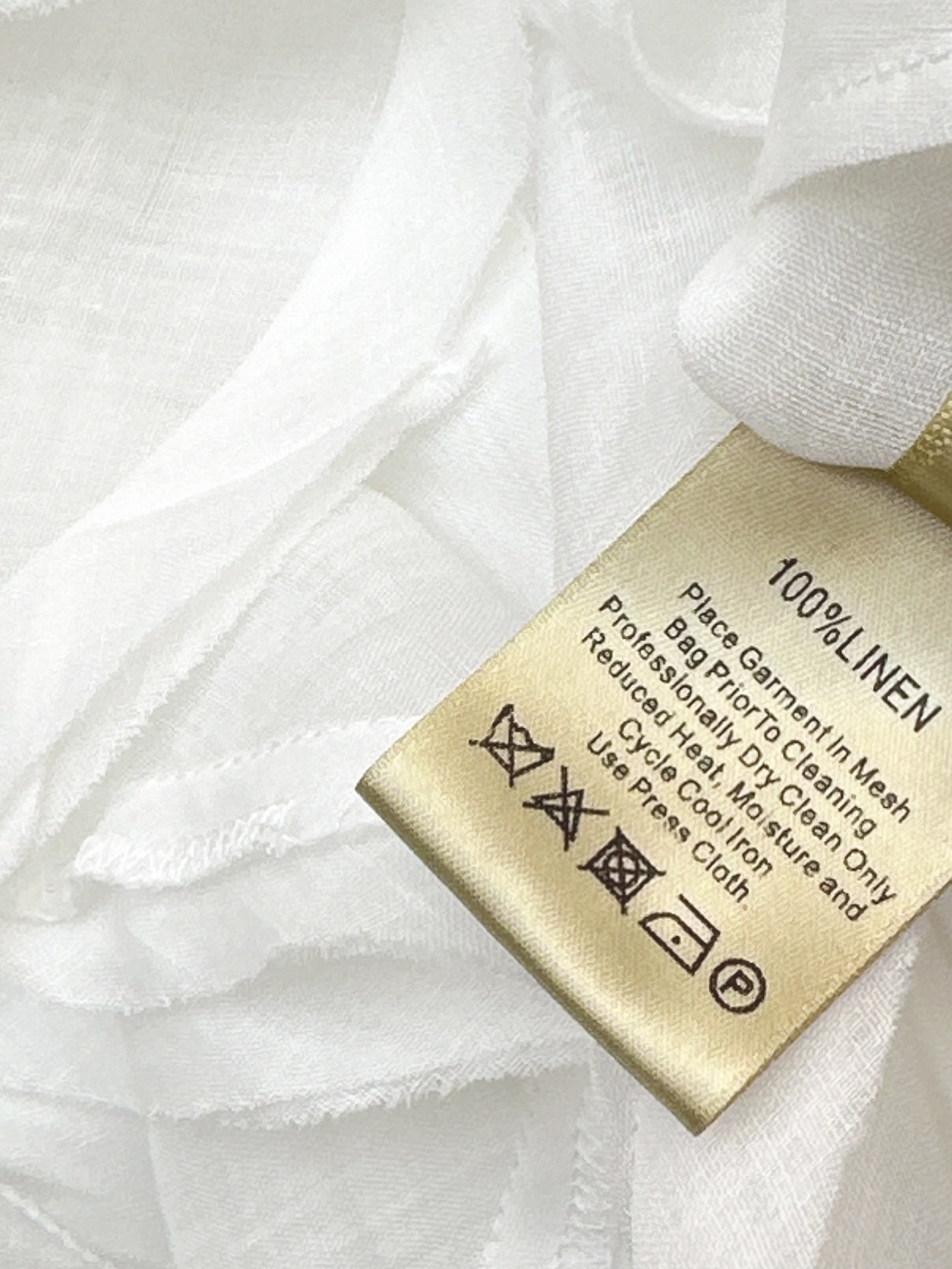 Chol 26ss ruffle sleeveless shirt