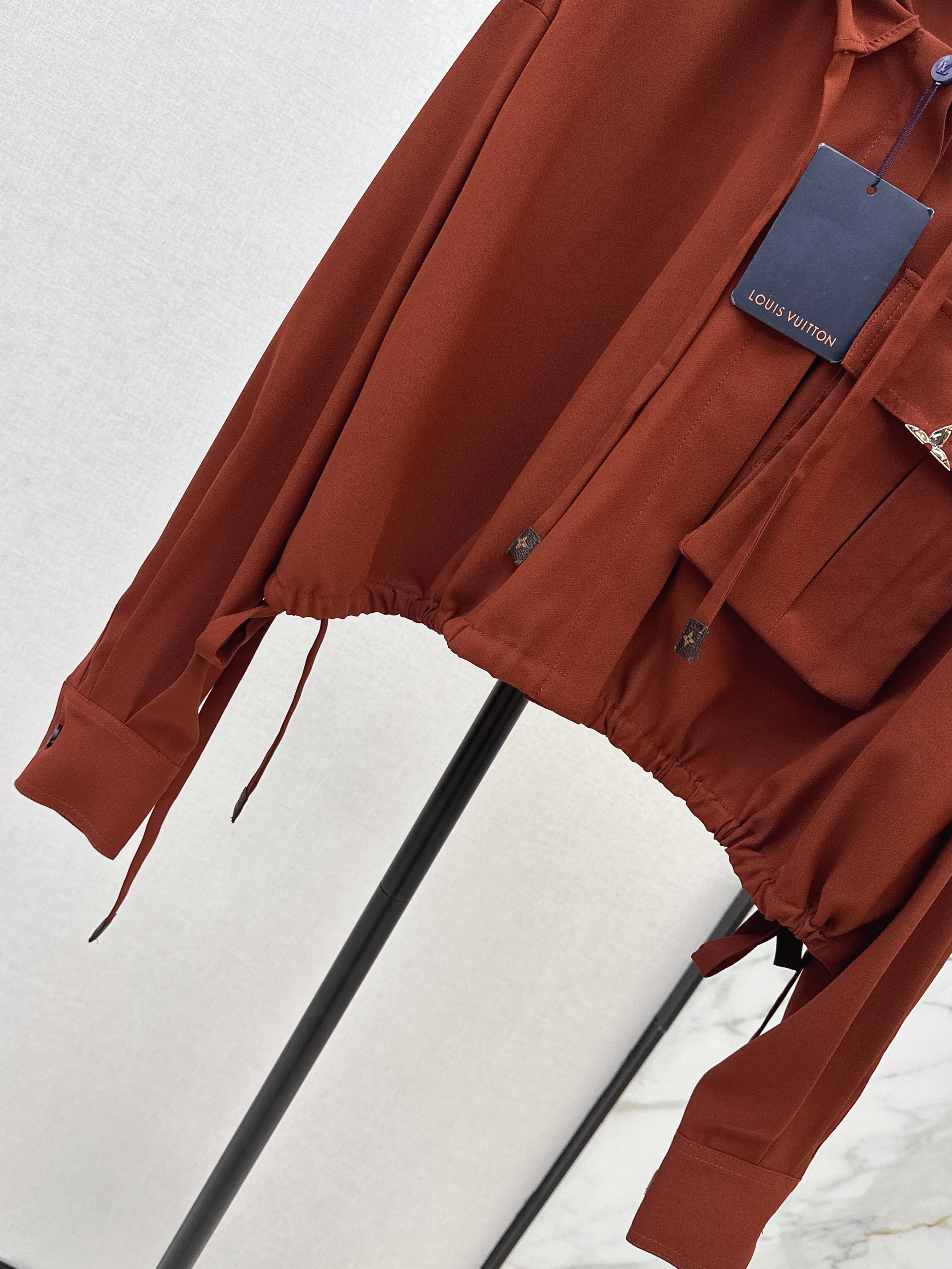 Loui 26ss hoodeddrawstring top