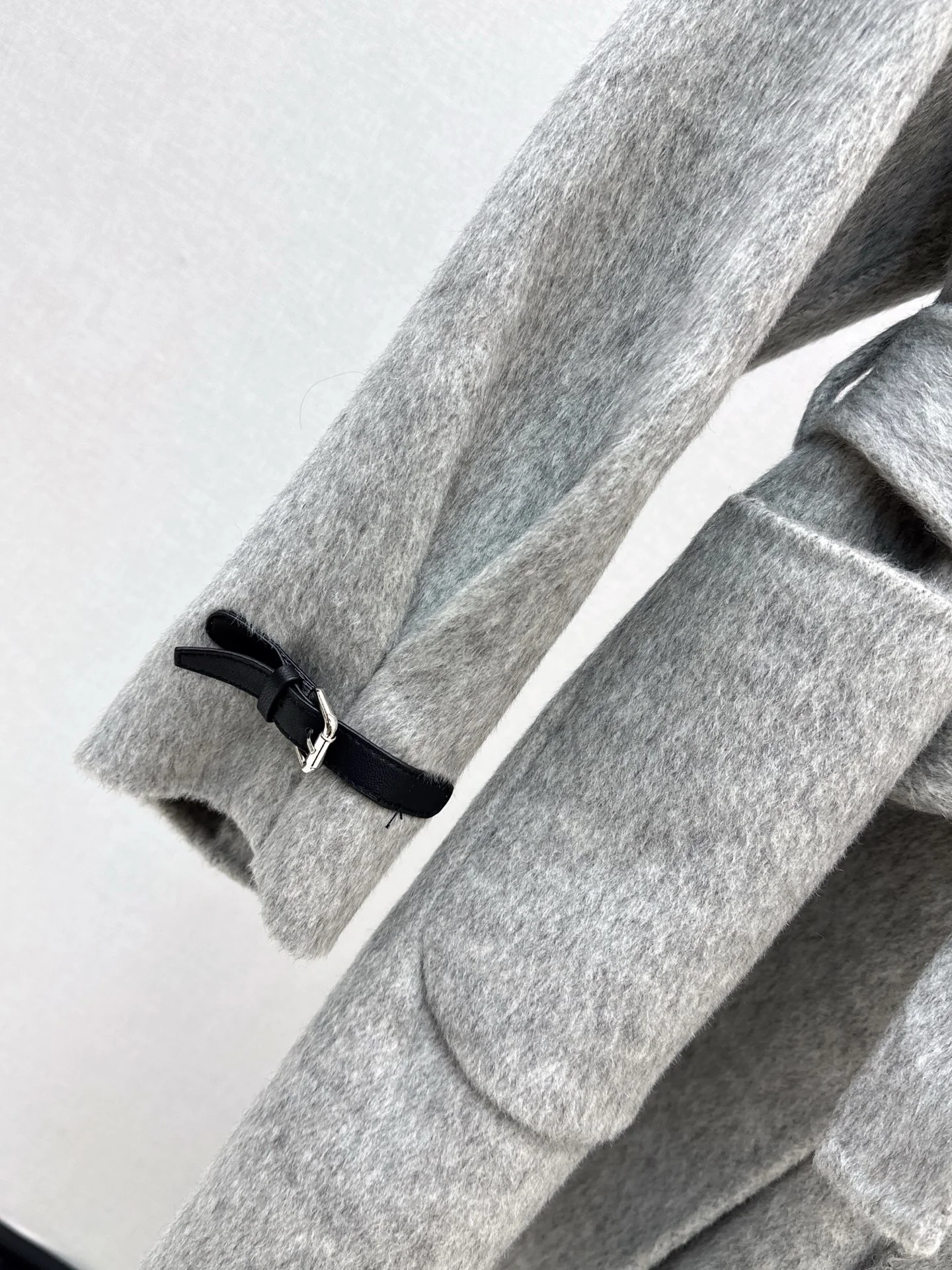 Her 25fw woolen belted overcoats