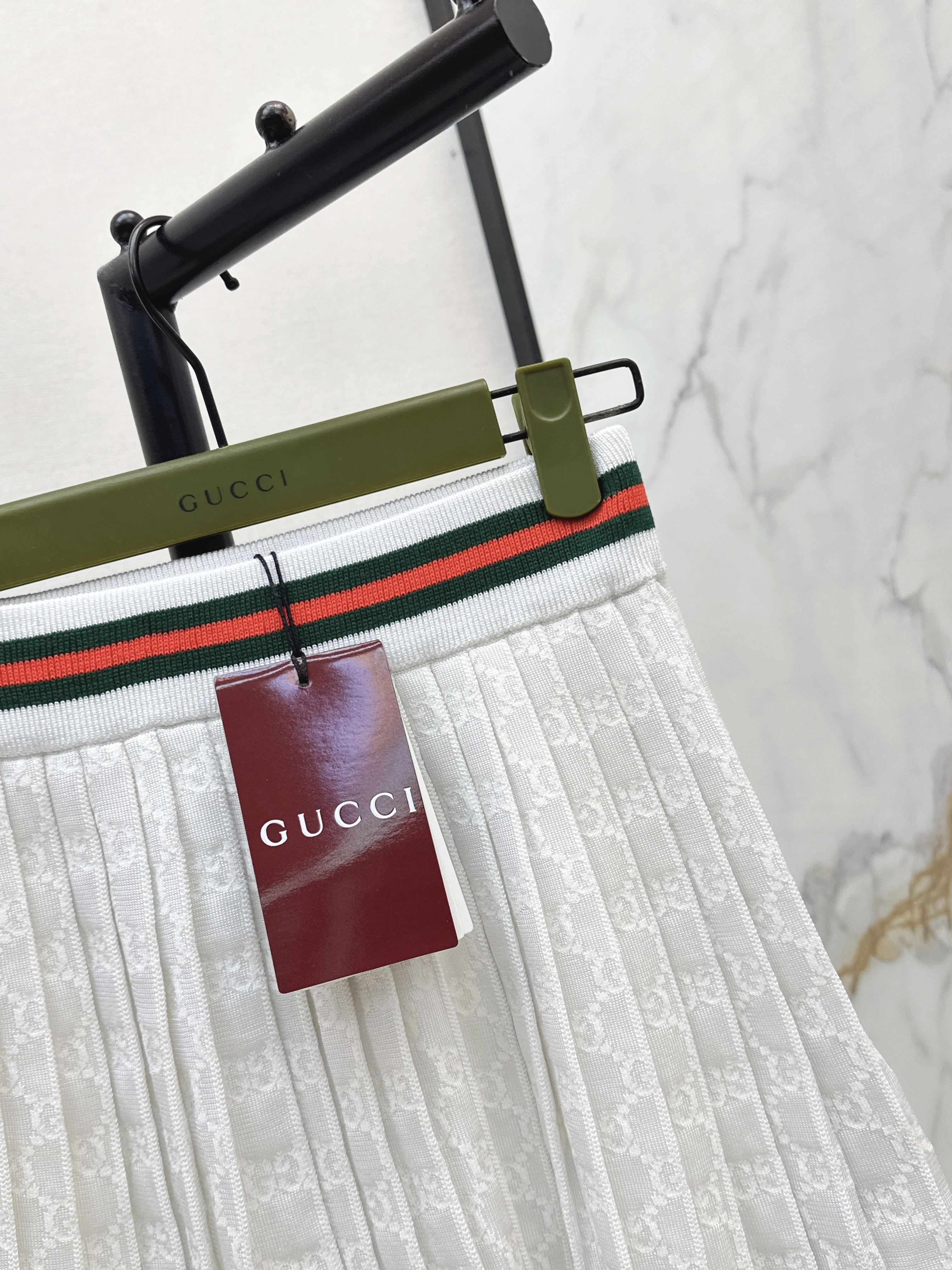 Guc 26ss jacquard pleated skirt