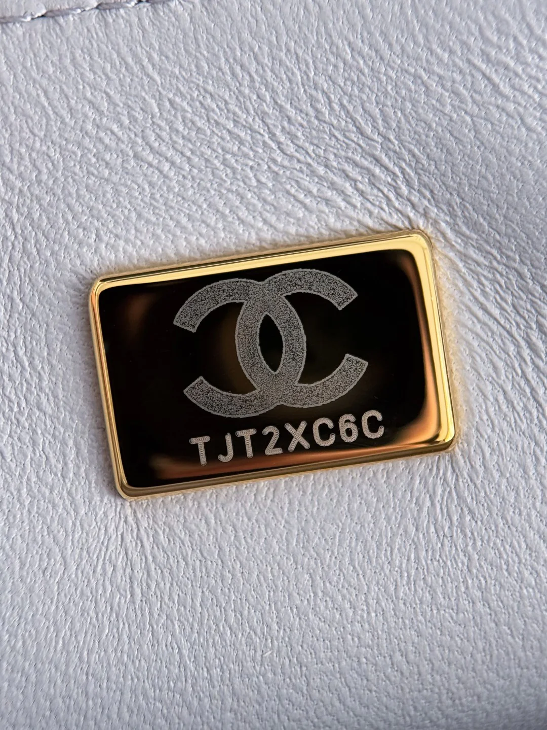 Chan 25P mini flap bag with top handle