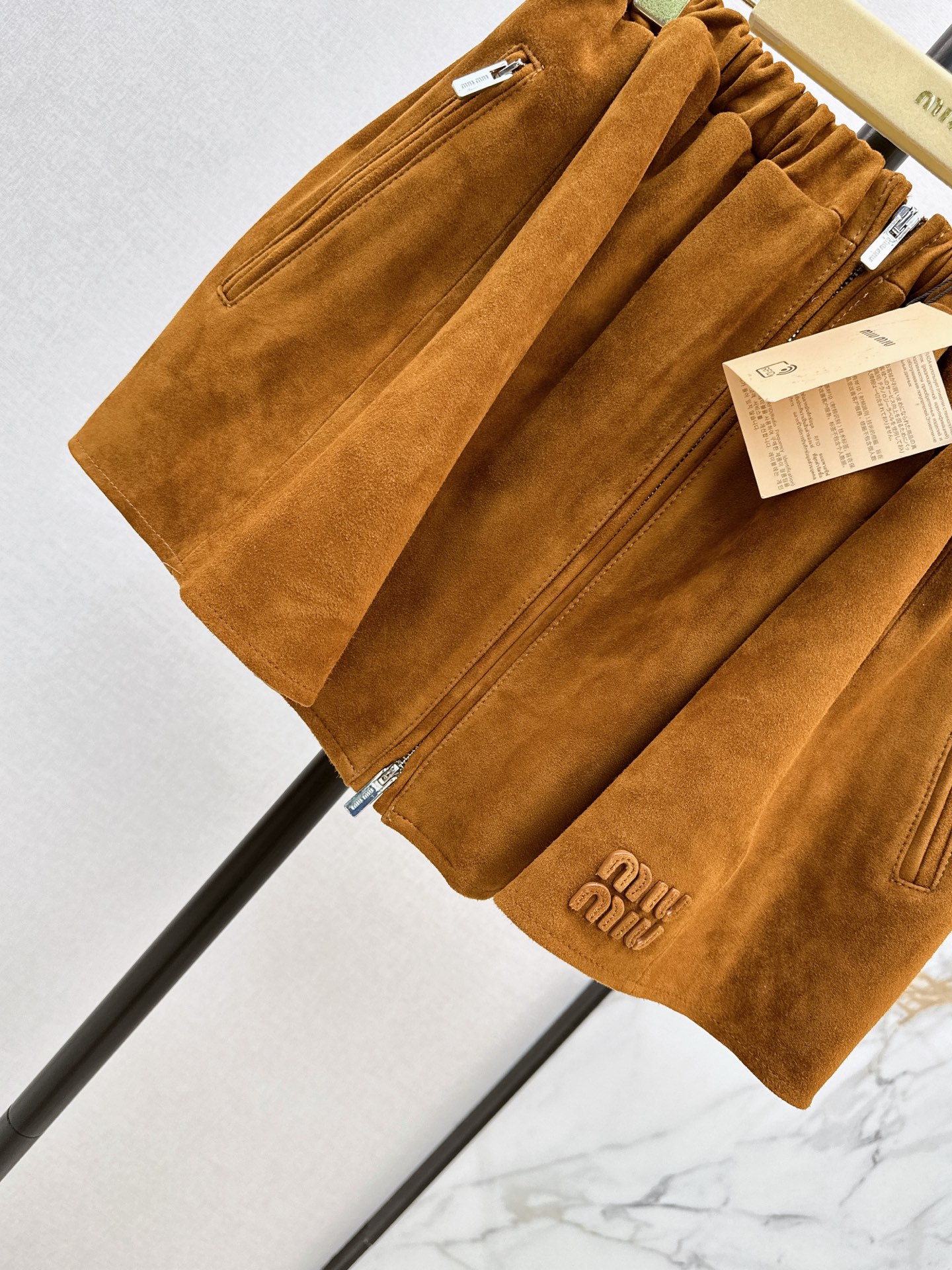 Miu 26ss suede leather mini skirt