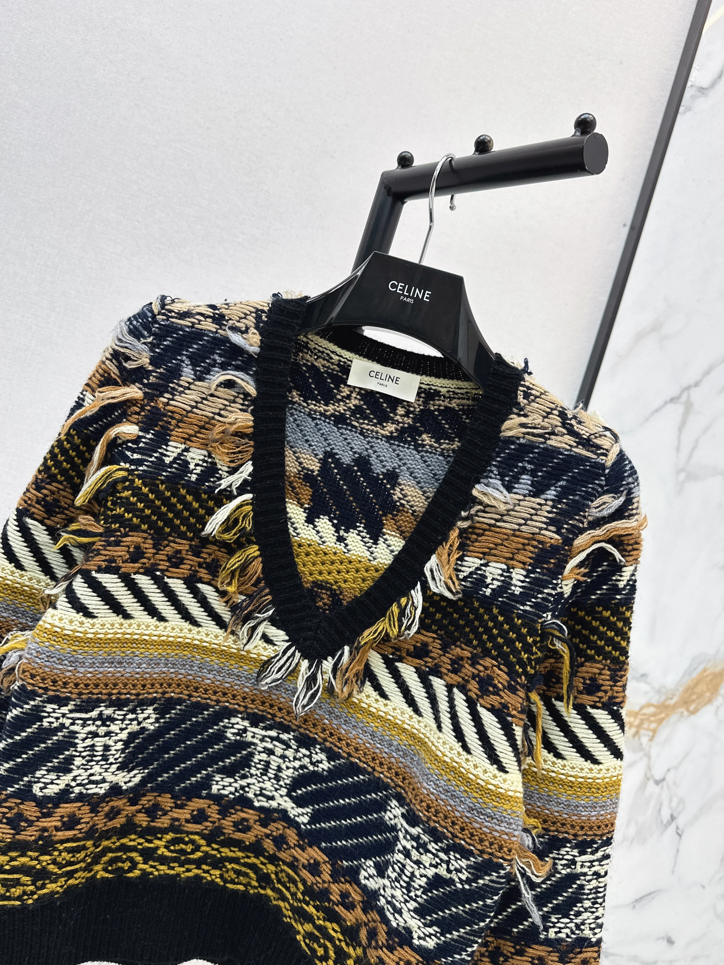 Celi 26ss tassel knit sweater